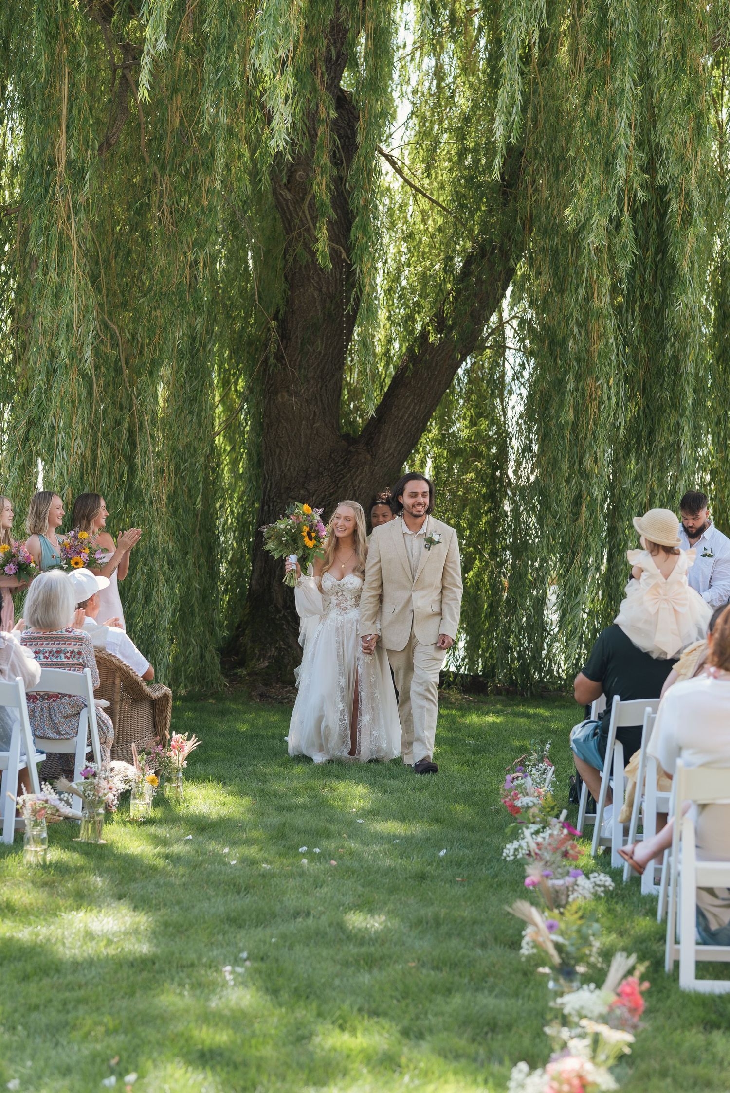 Wedding couple portraits during ceremony in Sandpoint, Idaho. Wedding photography for Spokane, Washington and Pacific northwest couples.