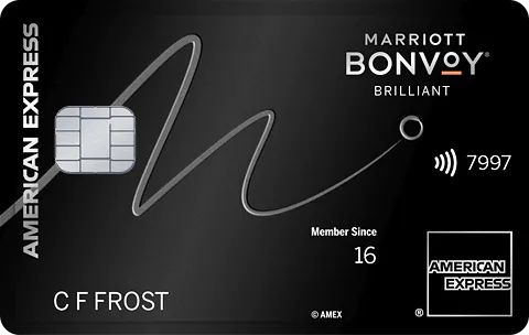 Black Marriott Bonvoy Brilliant American Express card with curved line design element.