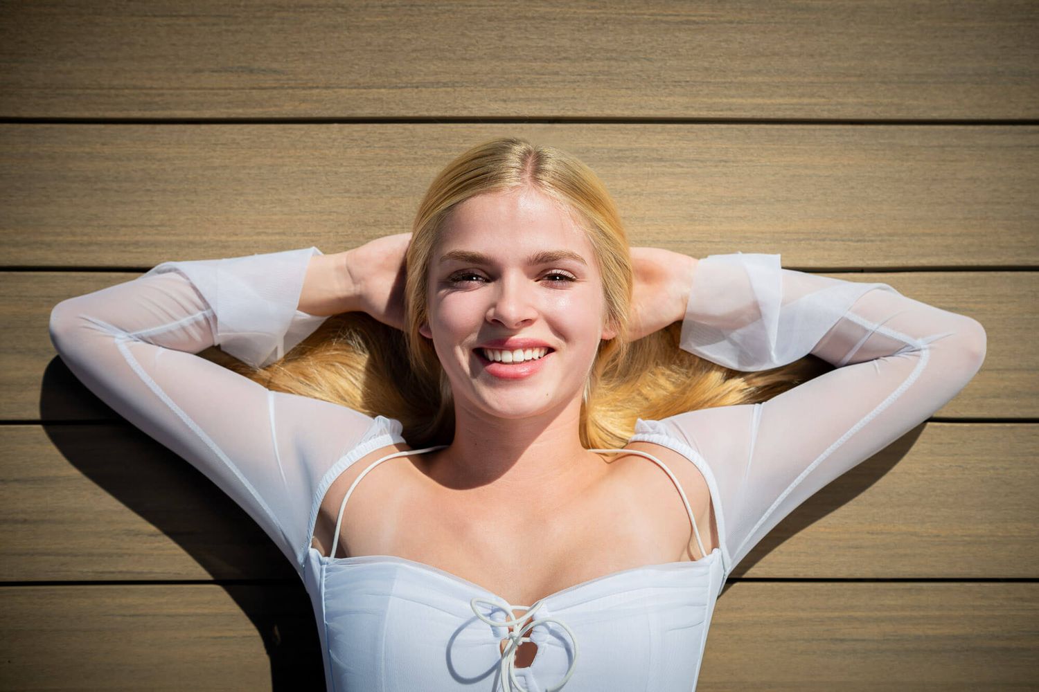 Series of casual poses against a rustic wooden wall backdrop.