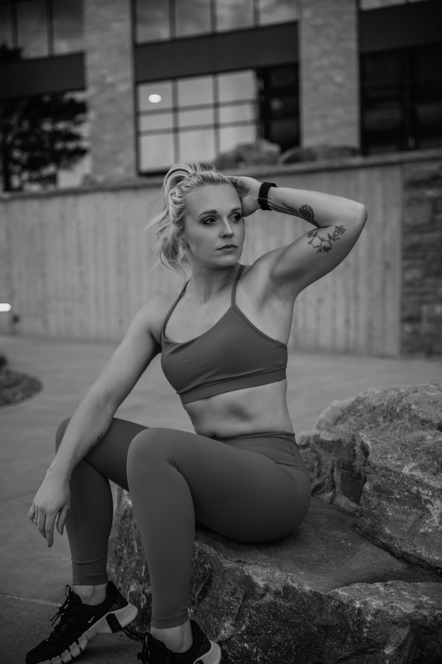 Black and white photo series showing athletic poses on urban concrete steps in workout attire.