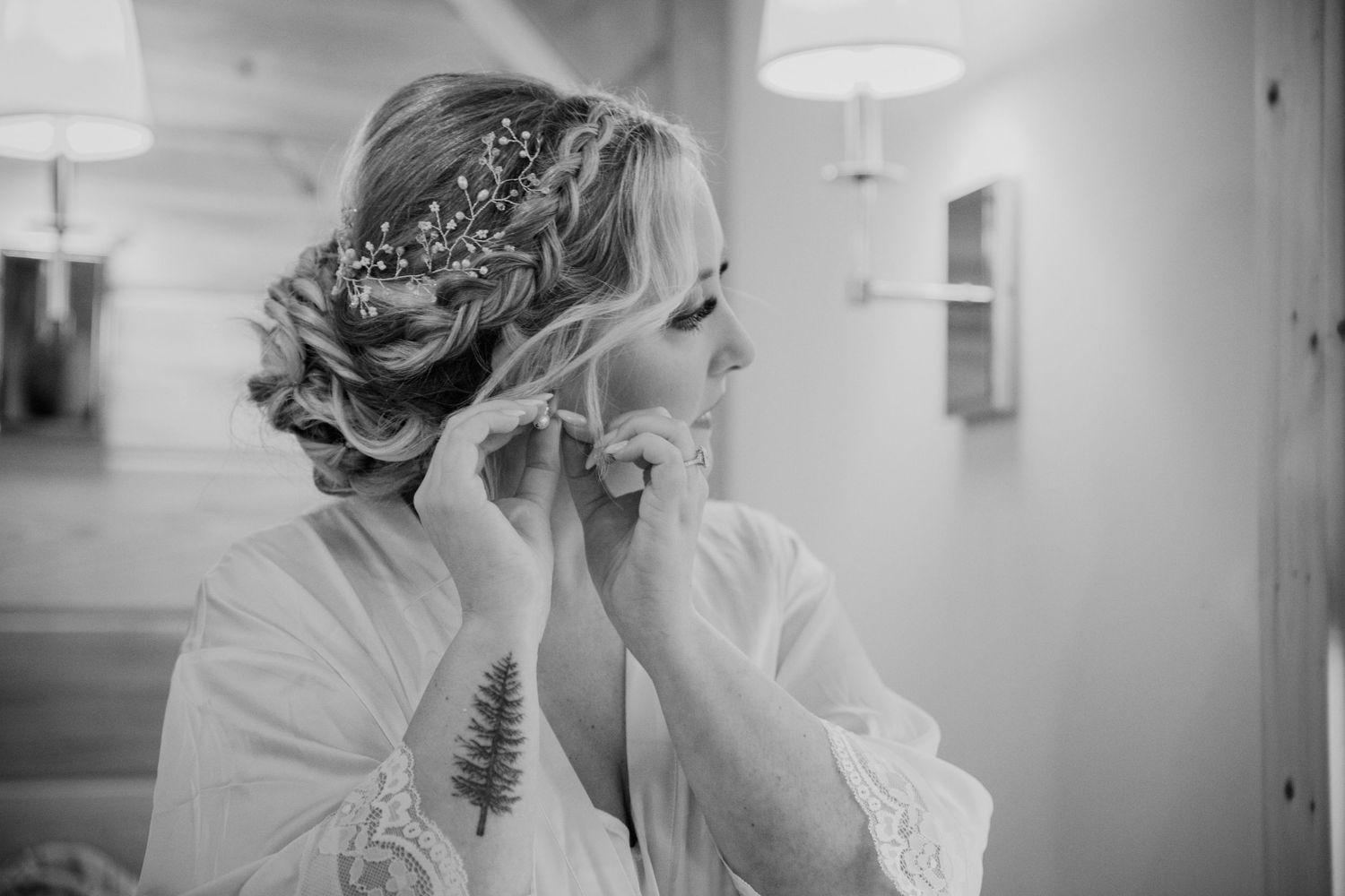 Stylish black and white image of wedding preparations in a bright room.