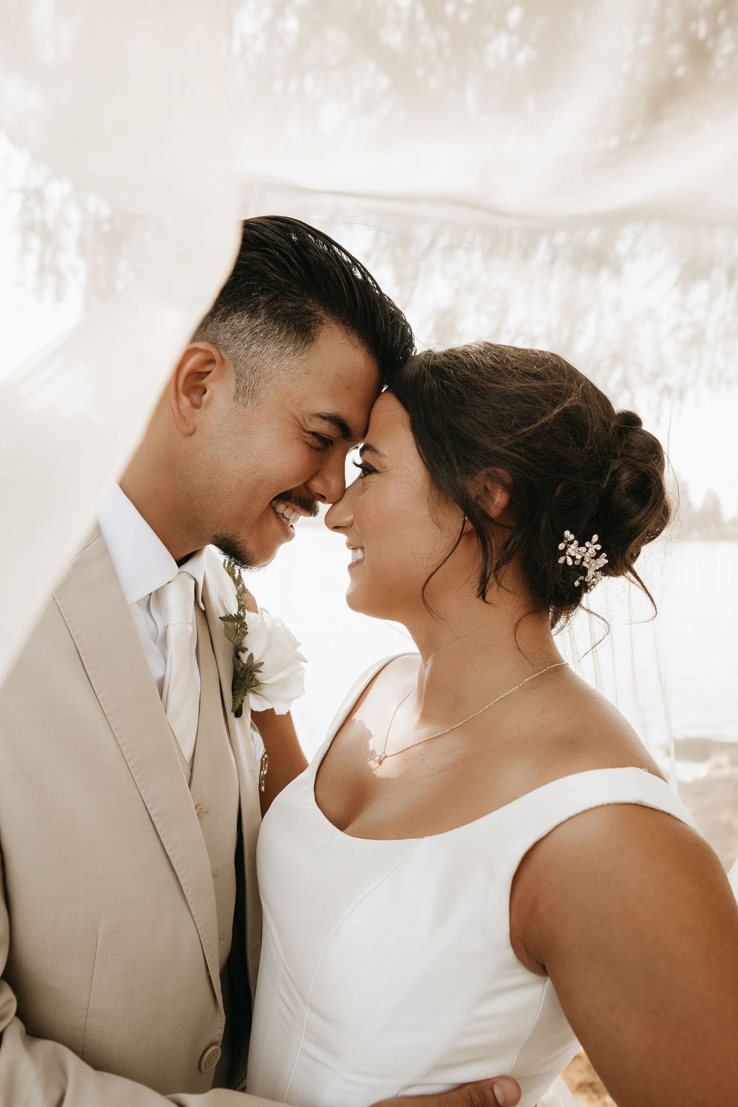 Romantic wedding couple shares intimate moments in three sepia-toned portraits showing tender affection.