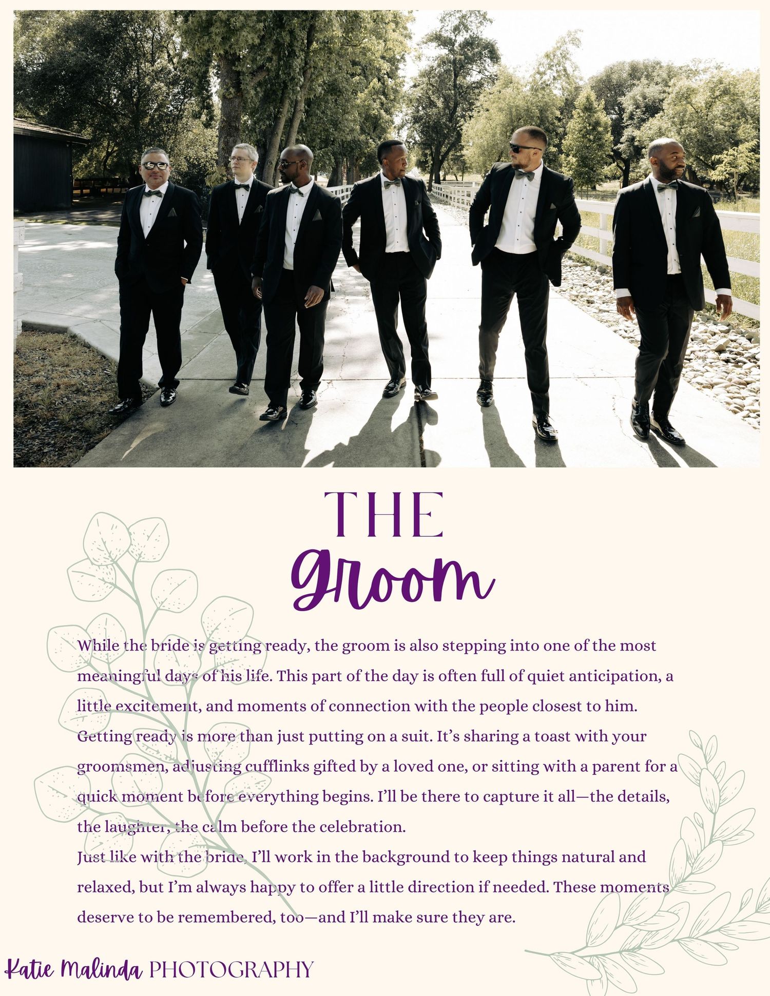 A group of six groomsmen in black tuxedos walk casually along a path outdoors on a sunny day.