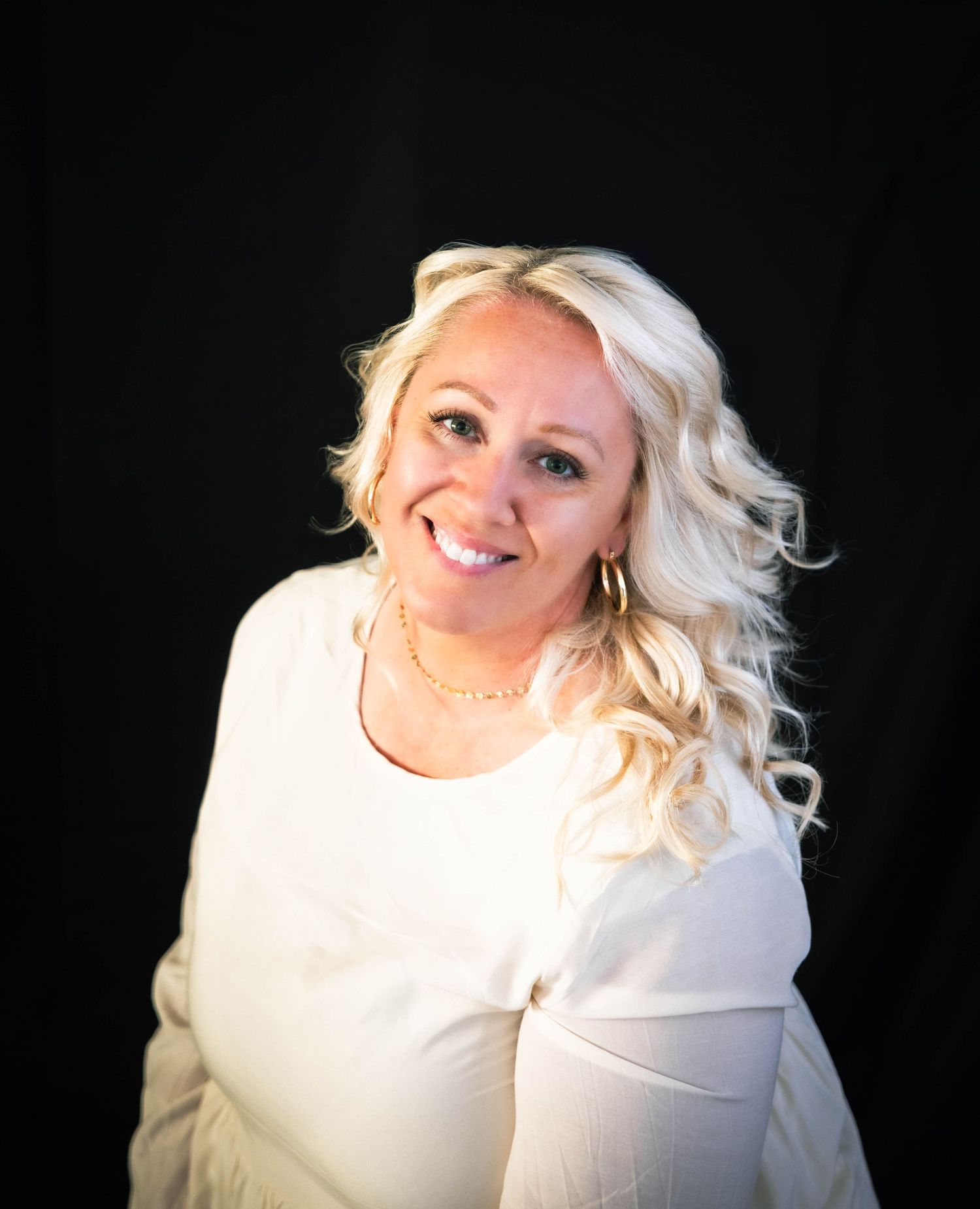 Lodi branding session with Katie Malinda, professional headshot photographer. Studio portrait with clean backdrop and confident style.
