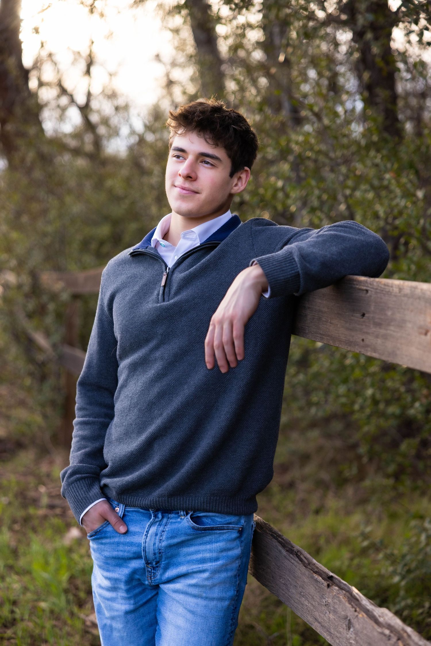 Senior portrait in Chico, CA—natural light, rustic charm, and a confident pose that captures timeless style and personality.