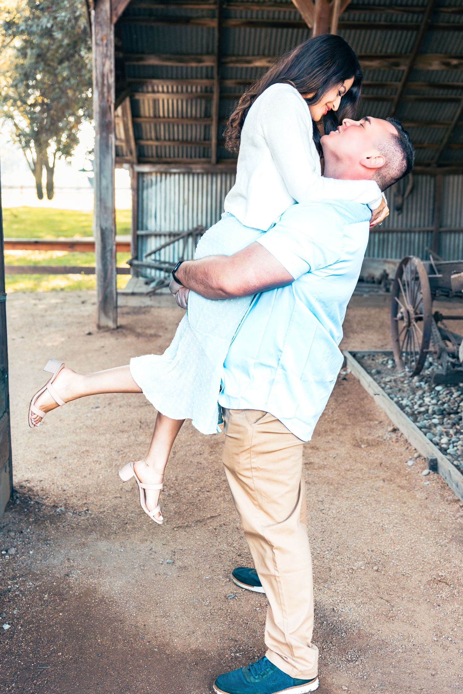 A series of motion shots showing someone in a white shirt and khaki pants performing a dance move in a covered area.