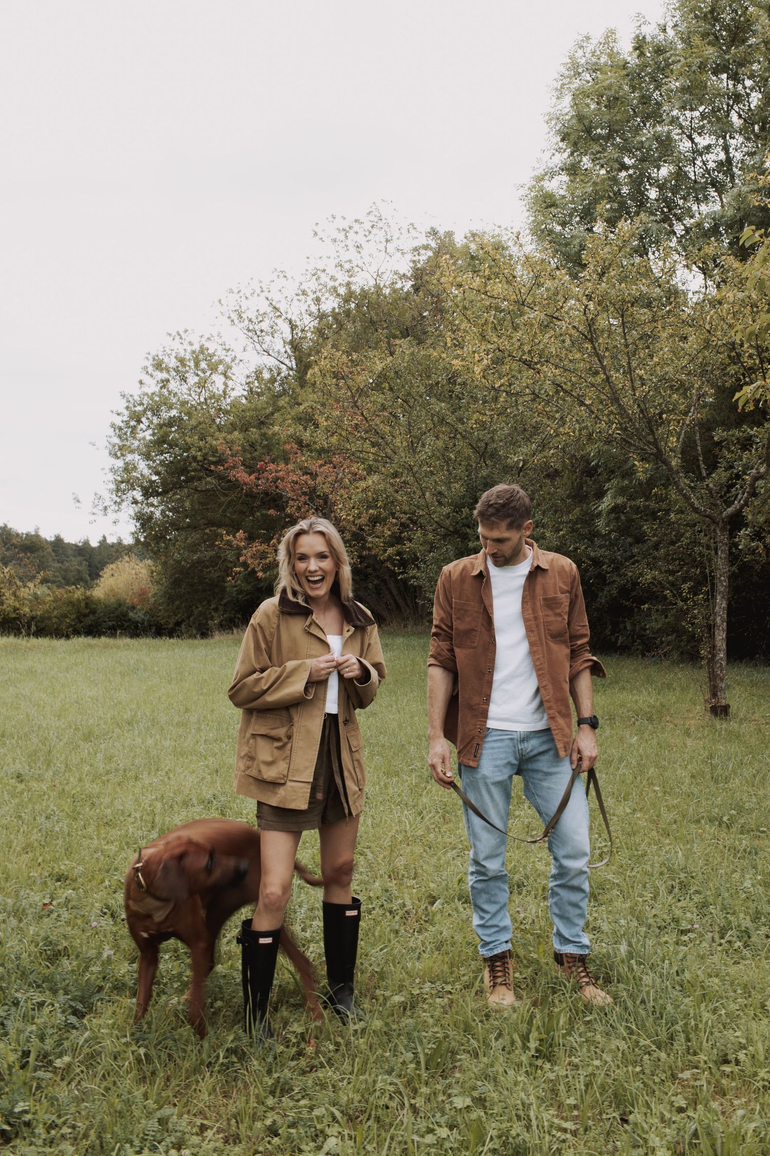 Sequence of photos showing a couple and their brown dog in a sunny autumn field.