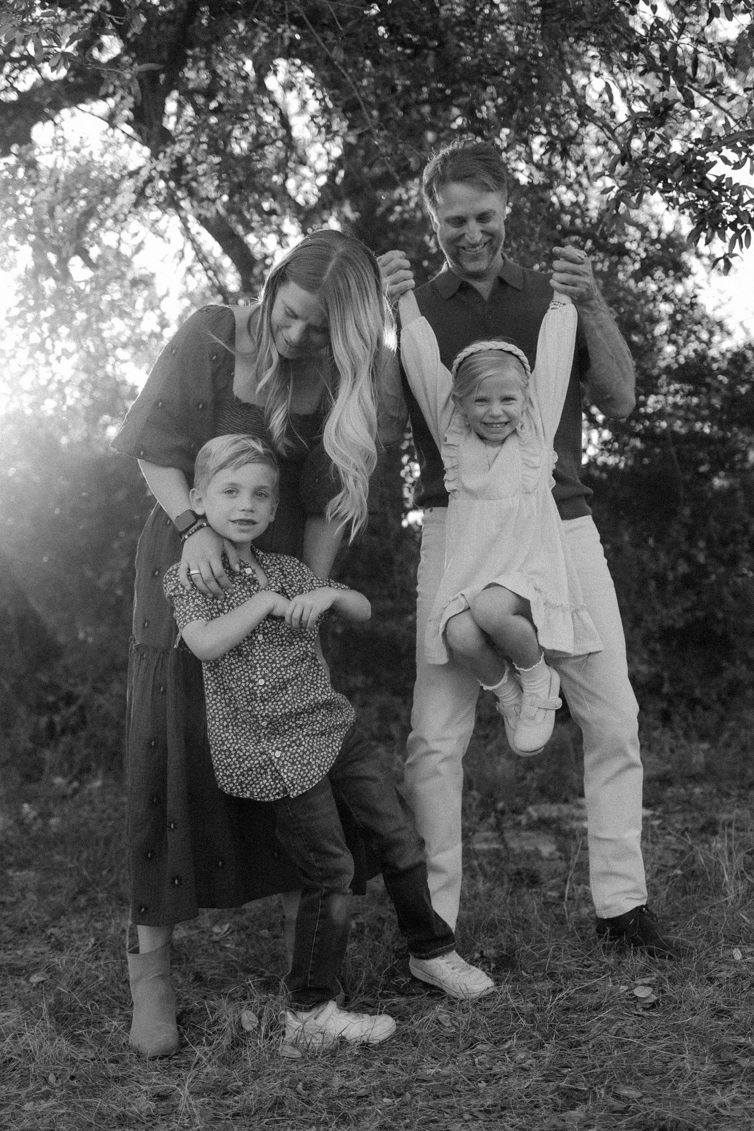 family candid photograph black and white outdoors south austin park