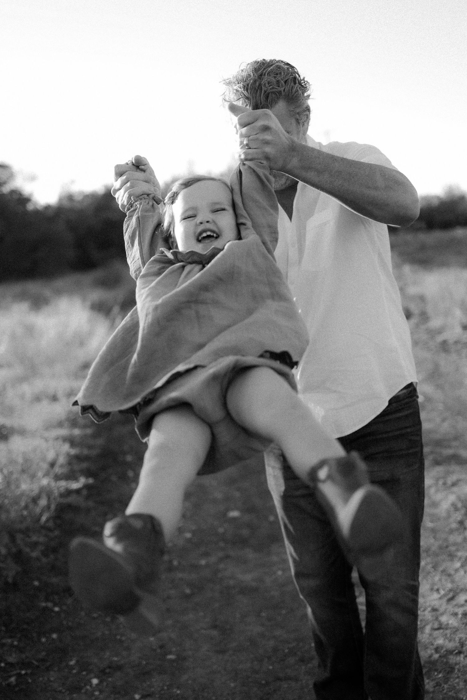 baby and dad, black and white photograph, texas hill country