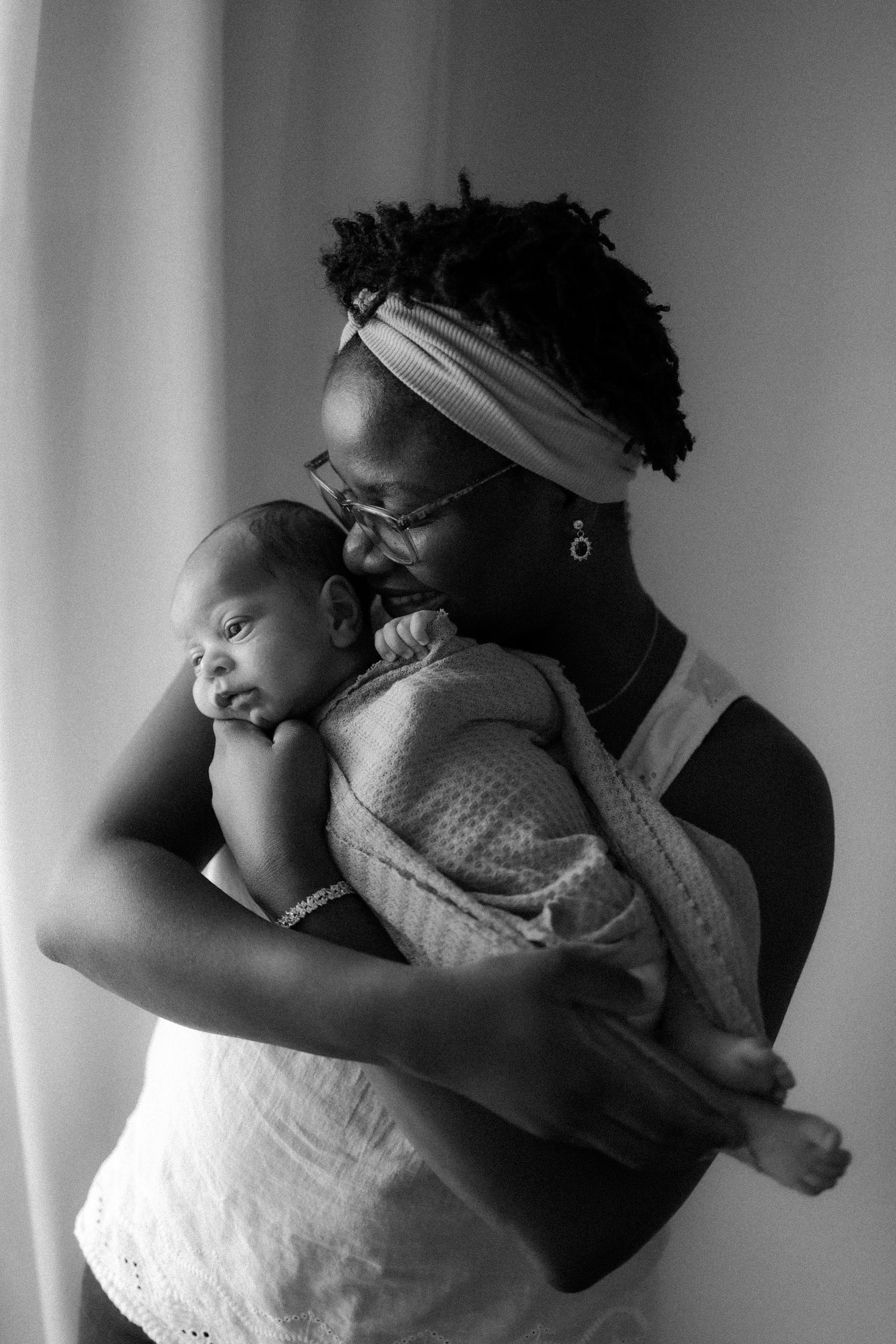 mom and newborn baby portrait black and white