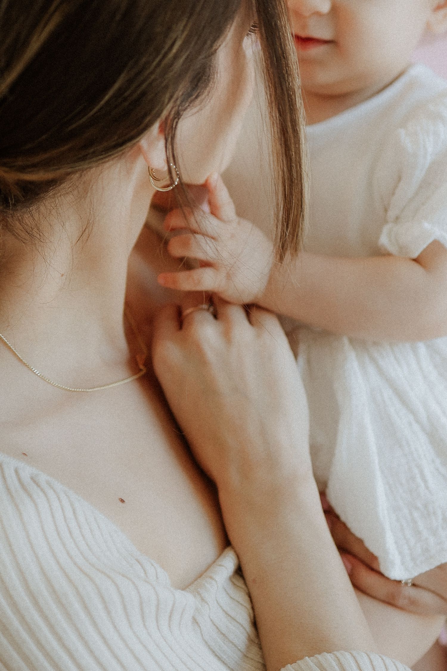 mom and baby, hands, detail, candid