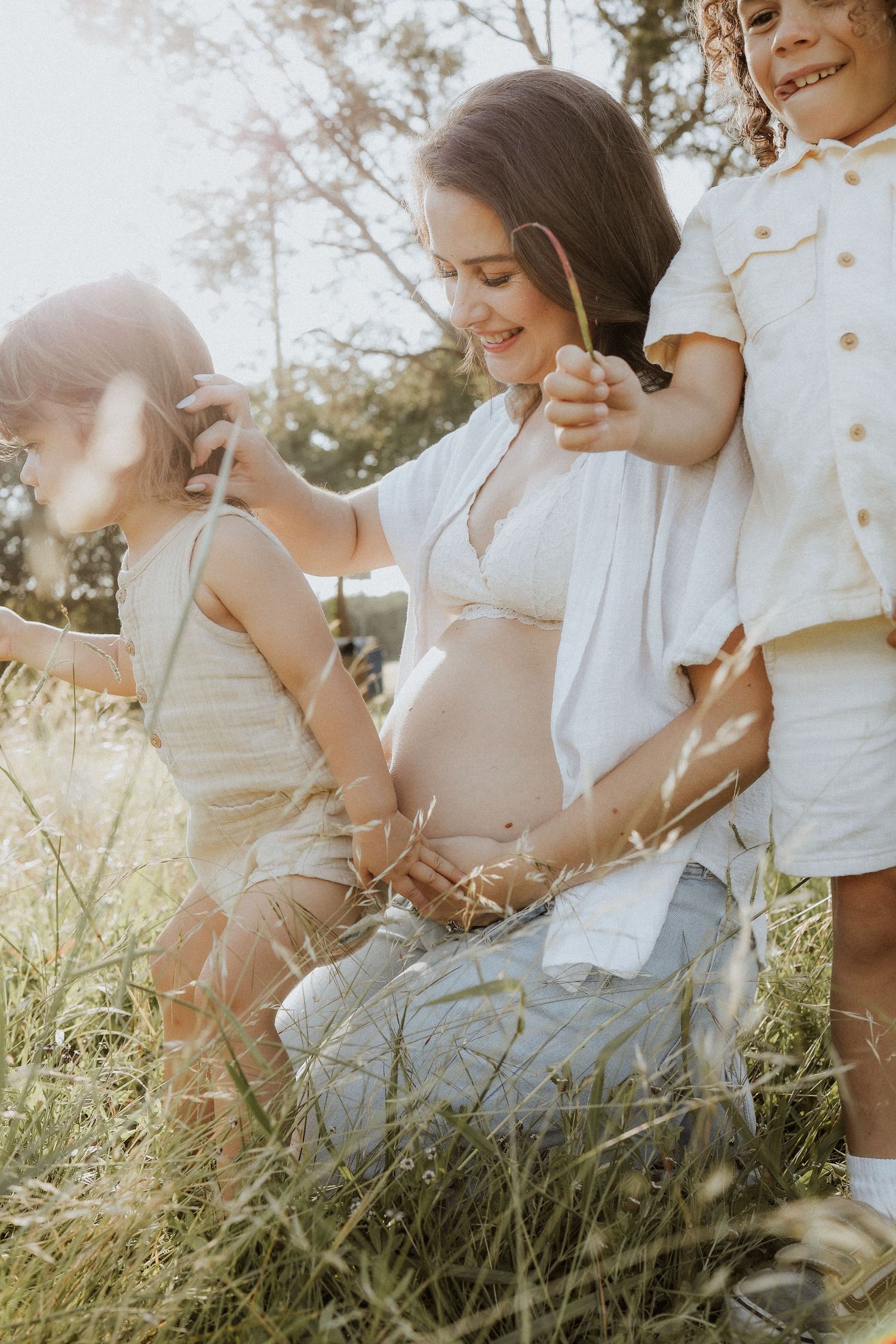 baby bump, mom to be, mom and sons, candid, aesthetic, outdoors, south austin