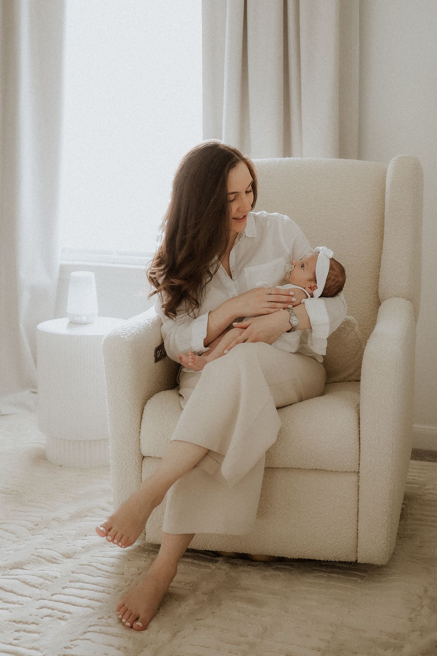 mom and newborn baby girl, lifestyle photography, in-home, chair