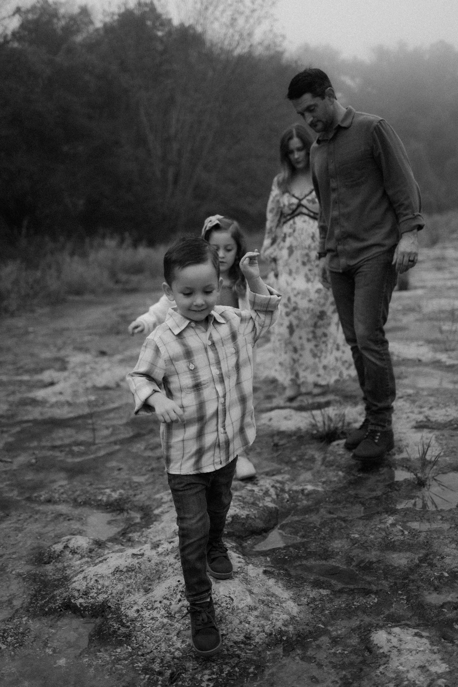 black and white family picture at bull creek park