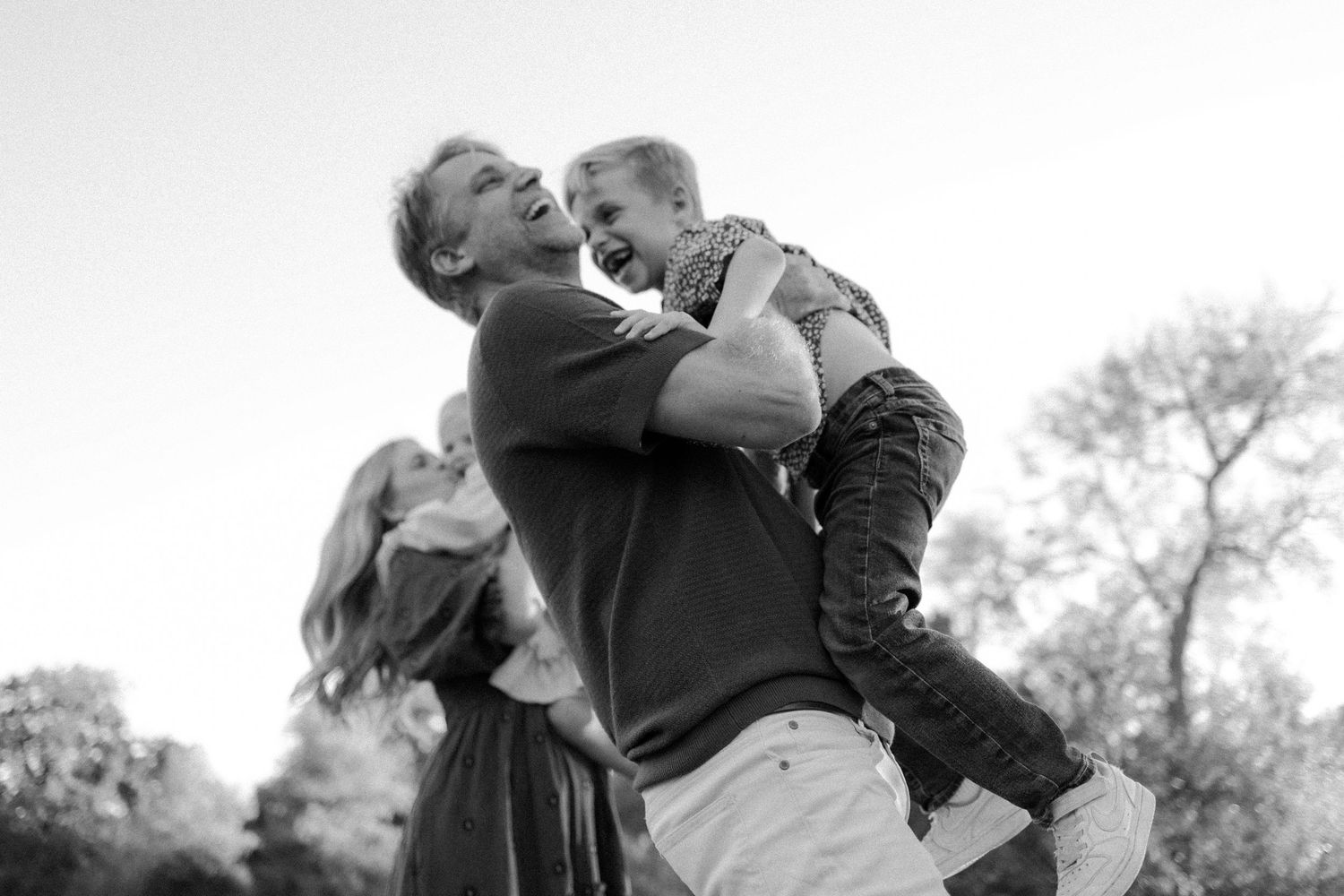 family candid photograph black and white outdoors south austin park
