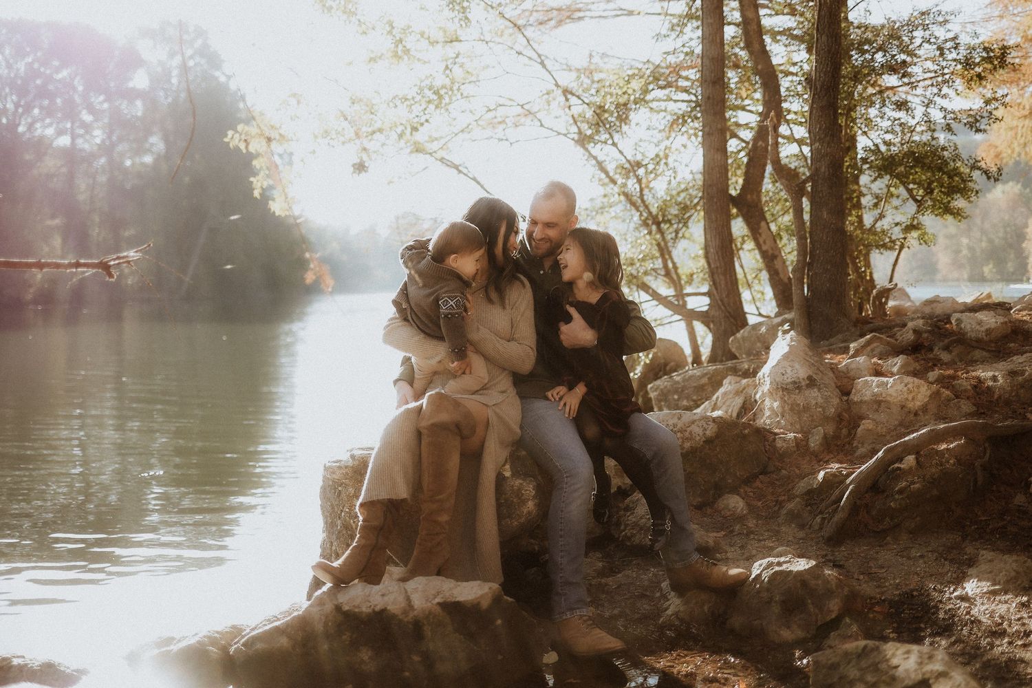 red bud isle family photoshoot by the water