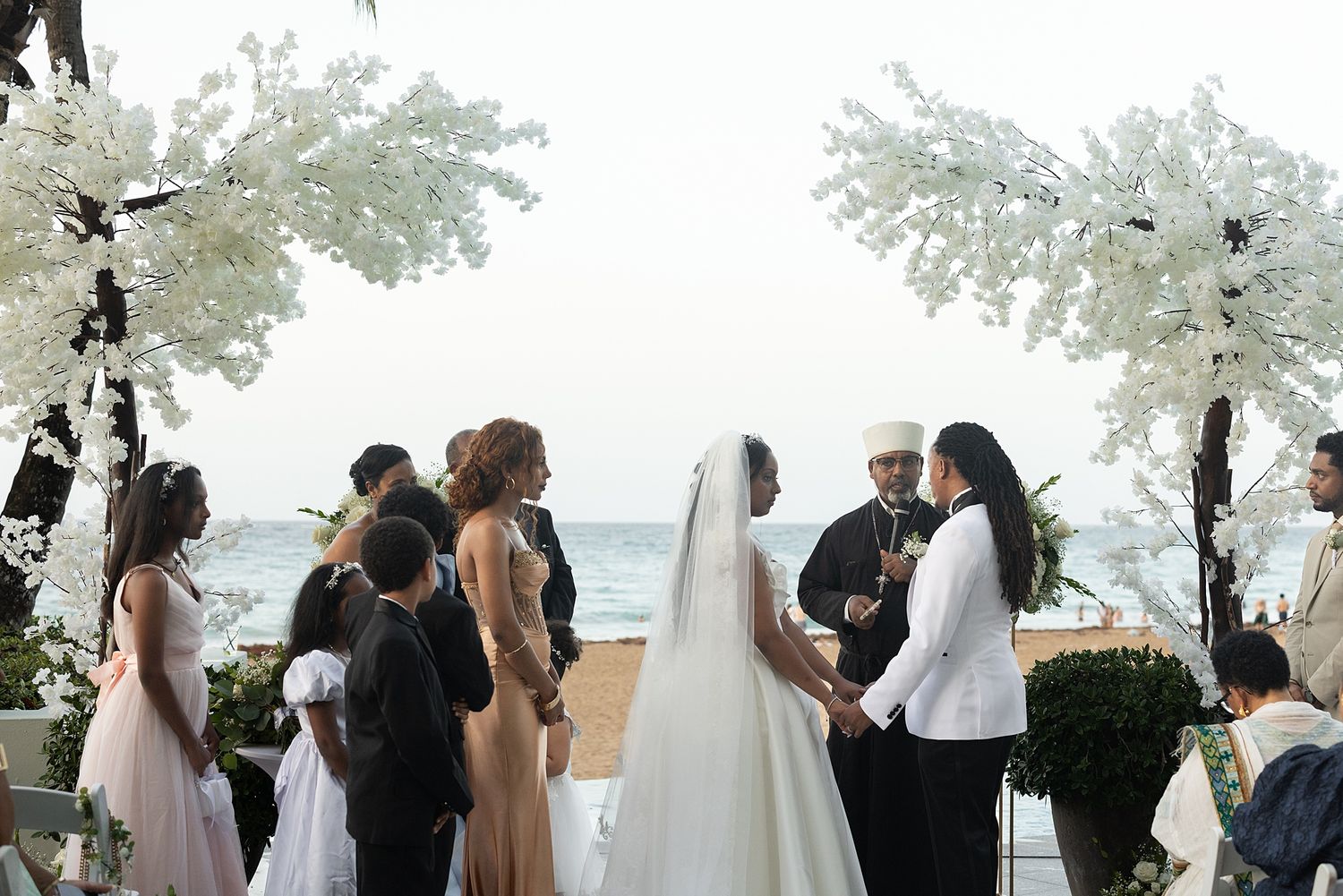 Bride and groom exchanging vows La Concha Resort oceanfront San Juan