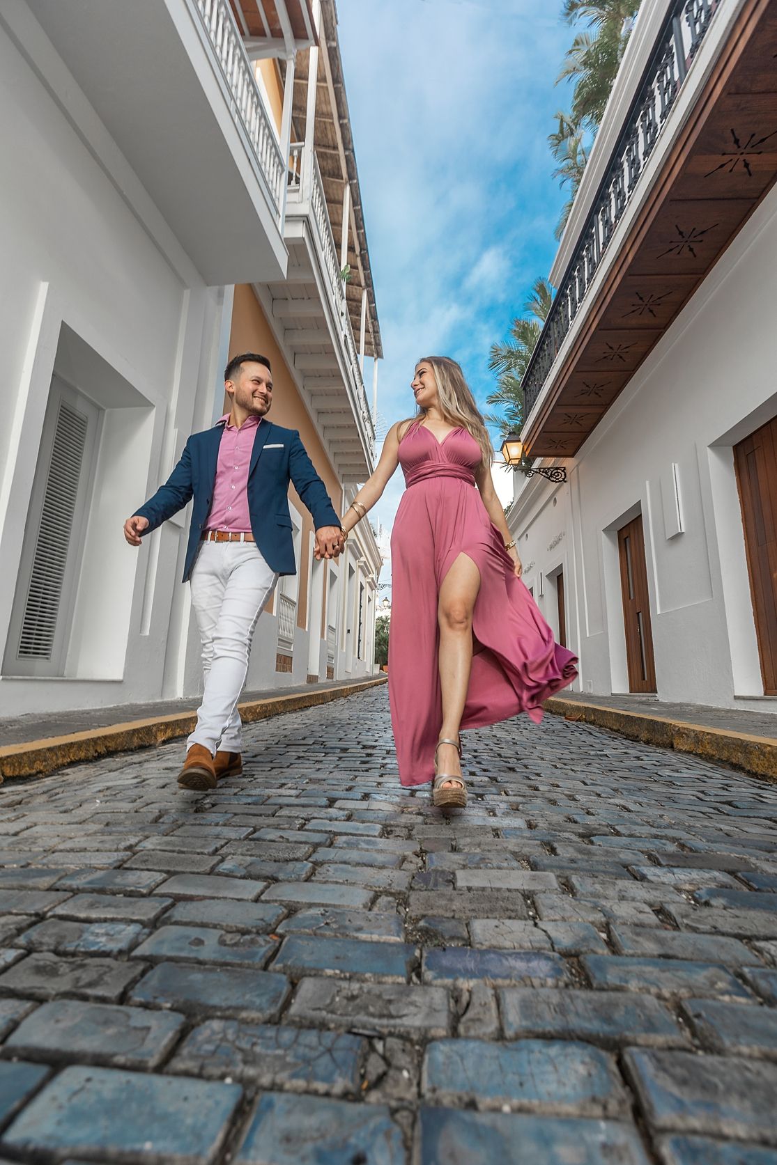 Couple portrait on cobblestone street Old San Juan Puerto Rico — love story photographer Raymond Vega