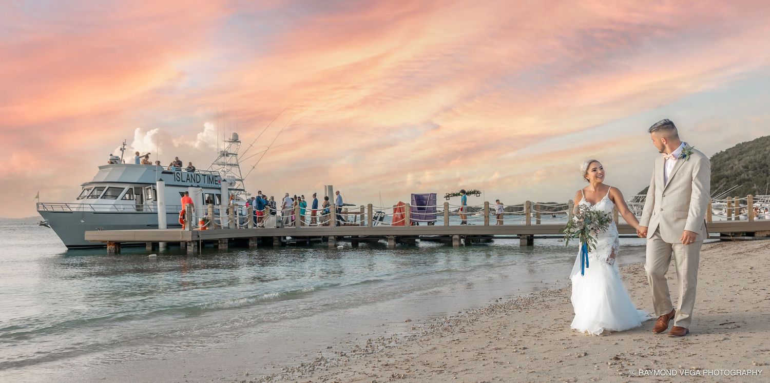 Couple at San Juan pier with cruise ship at sunset — wedding photographer Puerto Rico Raymond Vega