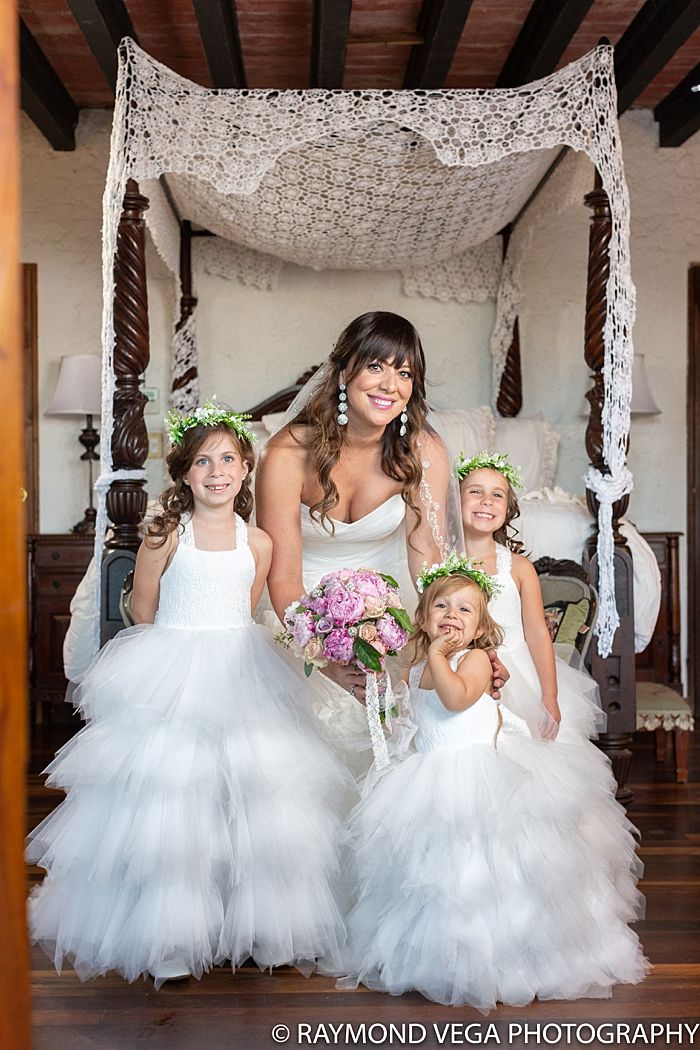 Bride with flower girls under decorated wedding canopy Puerto Rico Hacienda Siesta Alegre — Raymond Vega Photography