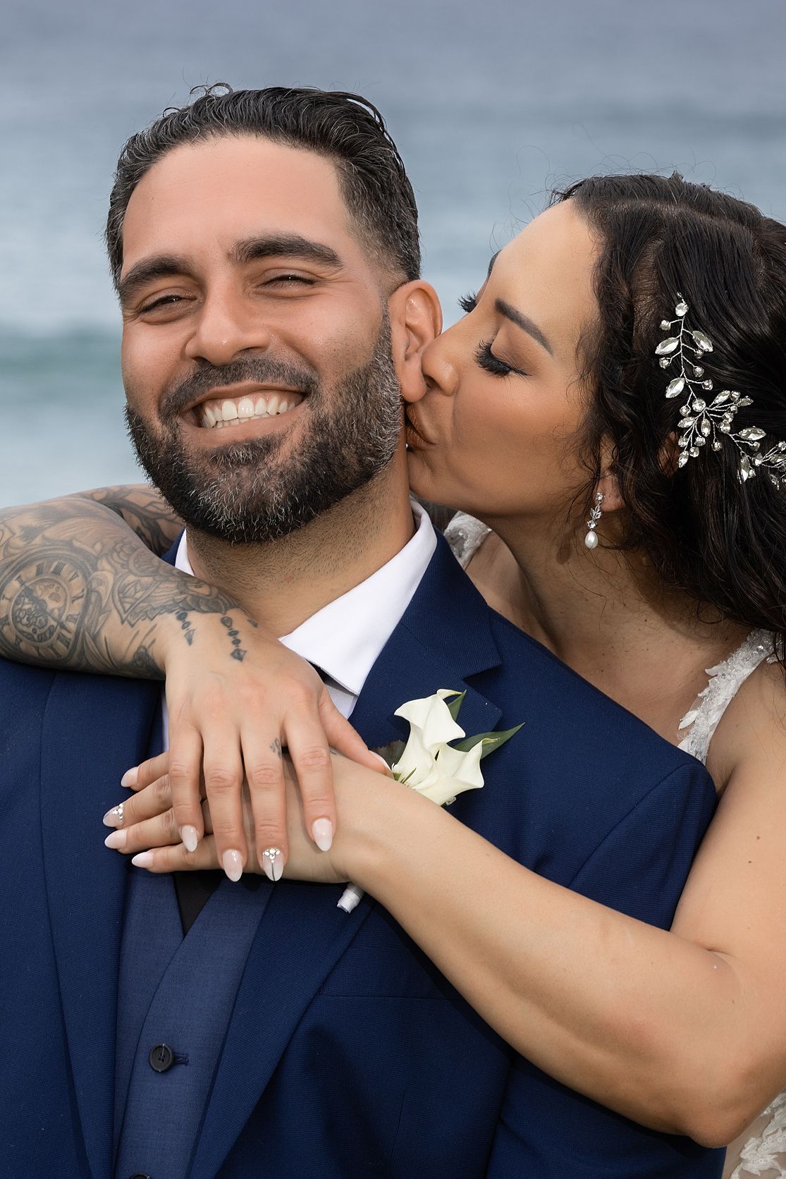 Happy couple showing wedding ring on beach Puerto Rico — destination wedding photographer Raymond Vega