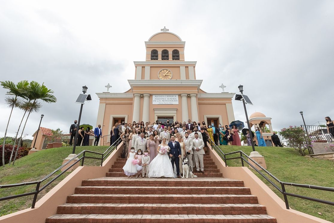 Full wedding party on steps of historic church Puerto Rico — destination wedding photographer Raymond Vega Photography + Cinema