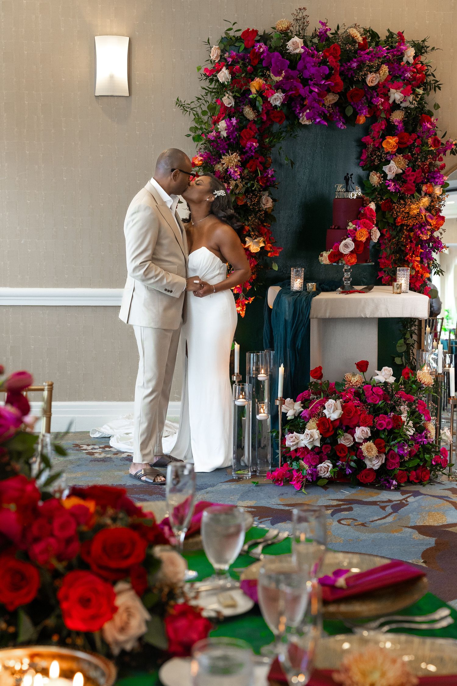 Stunning luxury wedding floral arch with vibrant tropical flowers at a destination wedding in San Juan, Puerto Rico — Raymond Vega Photograp