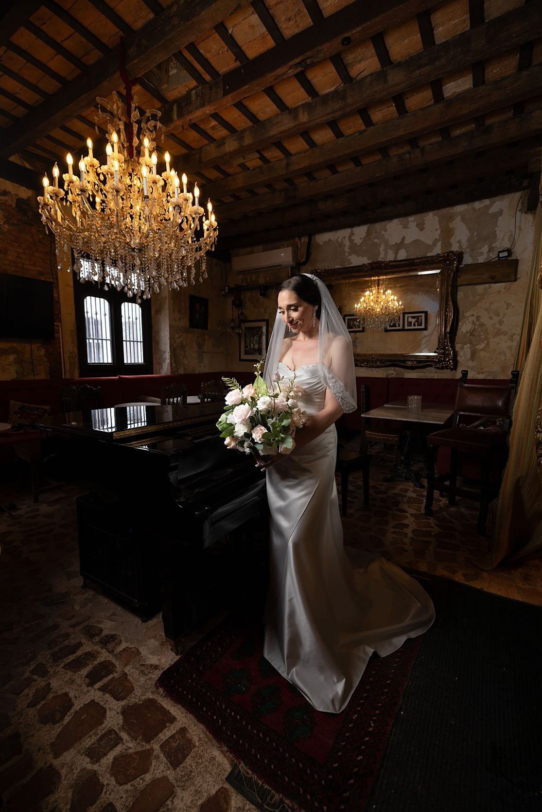 Bride portrait under golden chandelier at The Cannon Club Old San Juan Puerto Rico — Raymond Vega
