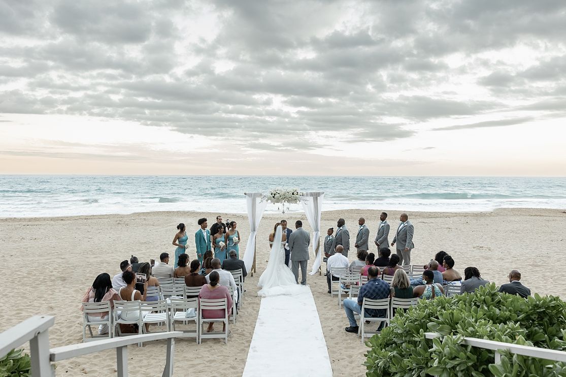 Outdoor beach wedding ceremony at San Juan Marriott Resort Puerto Rico — Raymond Vega Photography