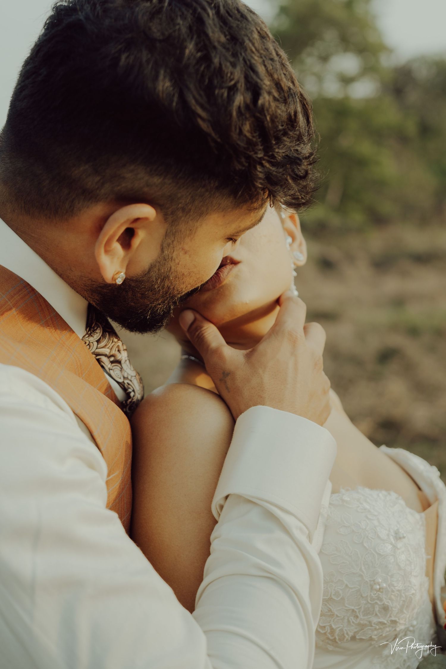 A series of four intimate wedding photos showing tender moments between a couple in white attire outdoors.