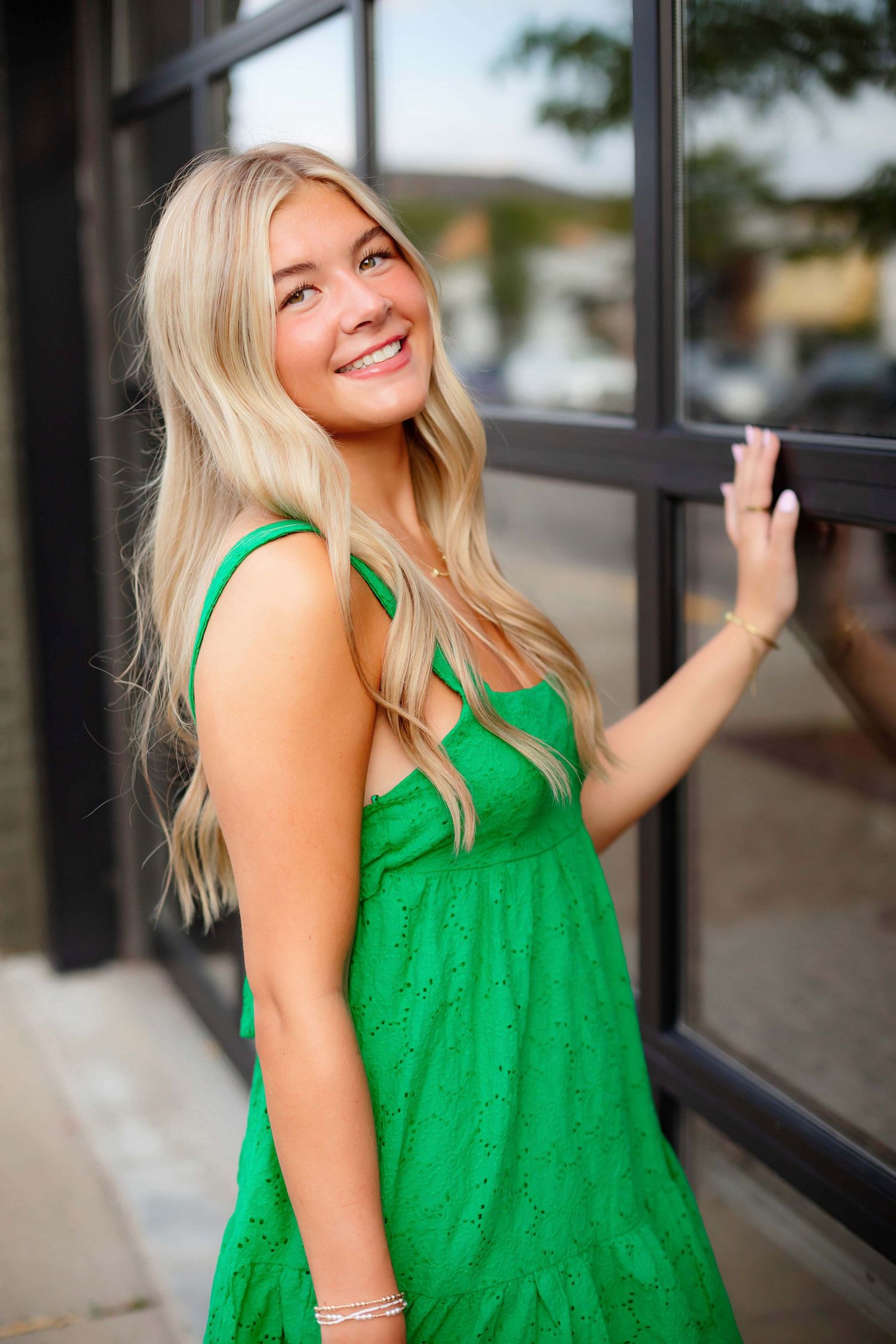 Minnetonka, Minnesota High School senior photography with Willow & Wren Photography. Downtown Wayzata, Minnesota.