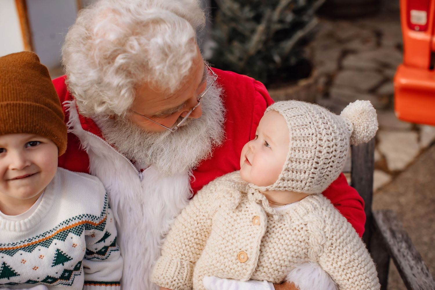 Heartwarming winter scene with festive sweater and knit hat details.