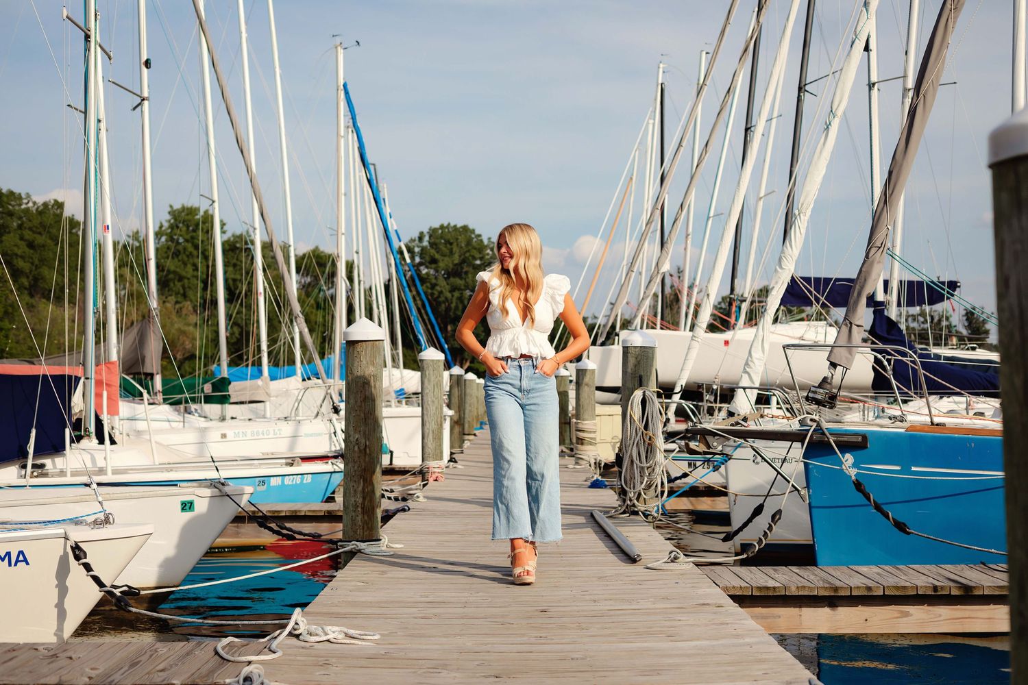 Minnetonka, Minnesota High School senior photography with Willow & Wren Photography. Downtown Wayzata, Minnesota.