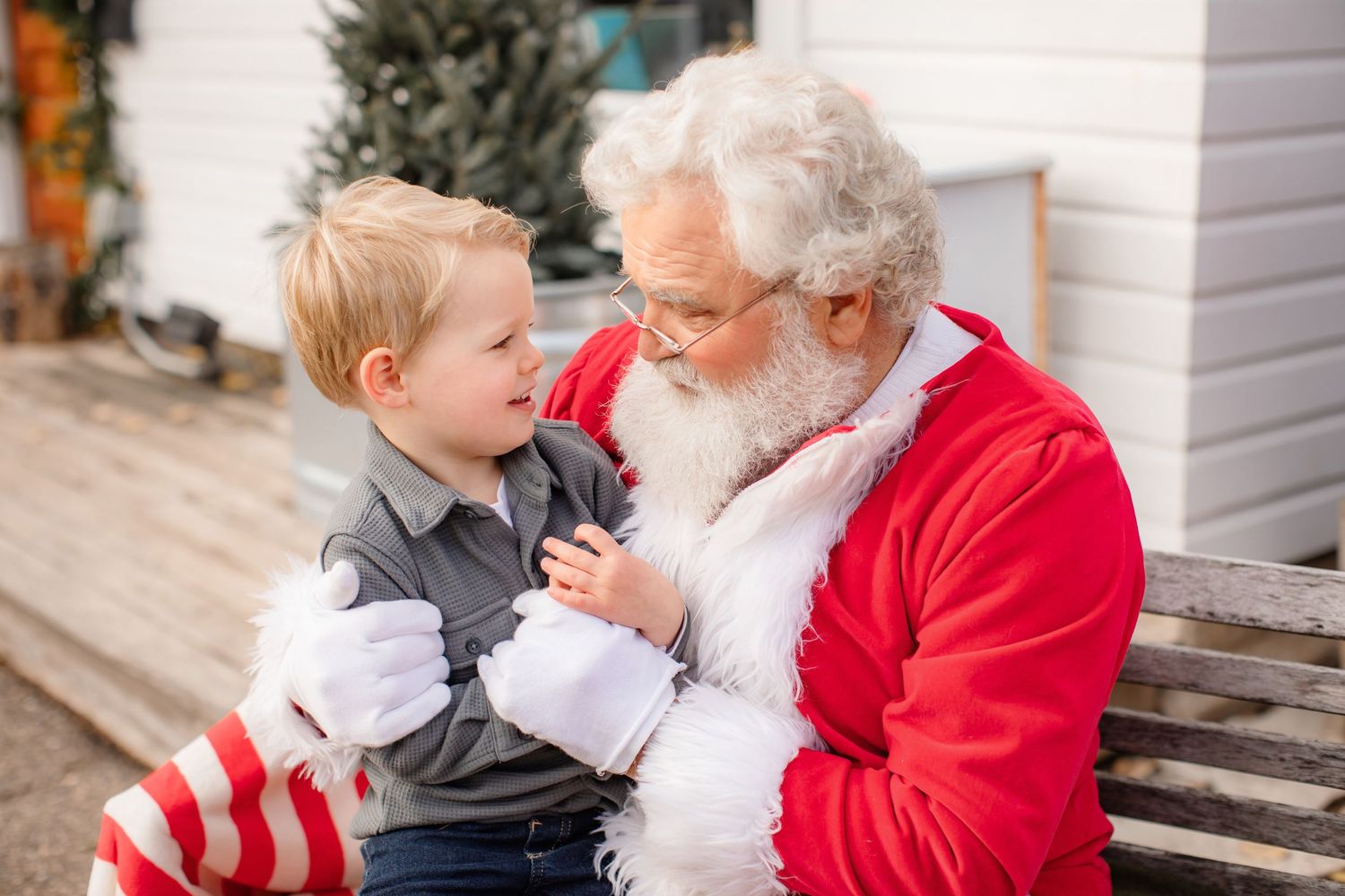Joyful winter moment captured outside with seasonal decorations.