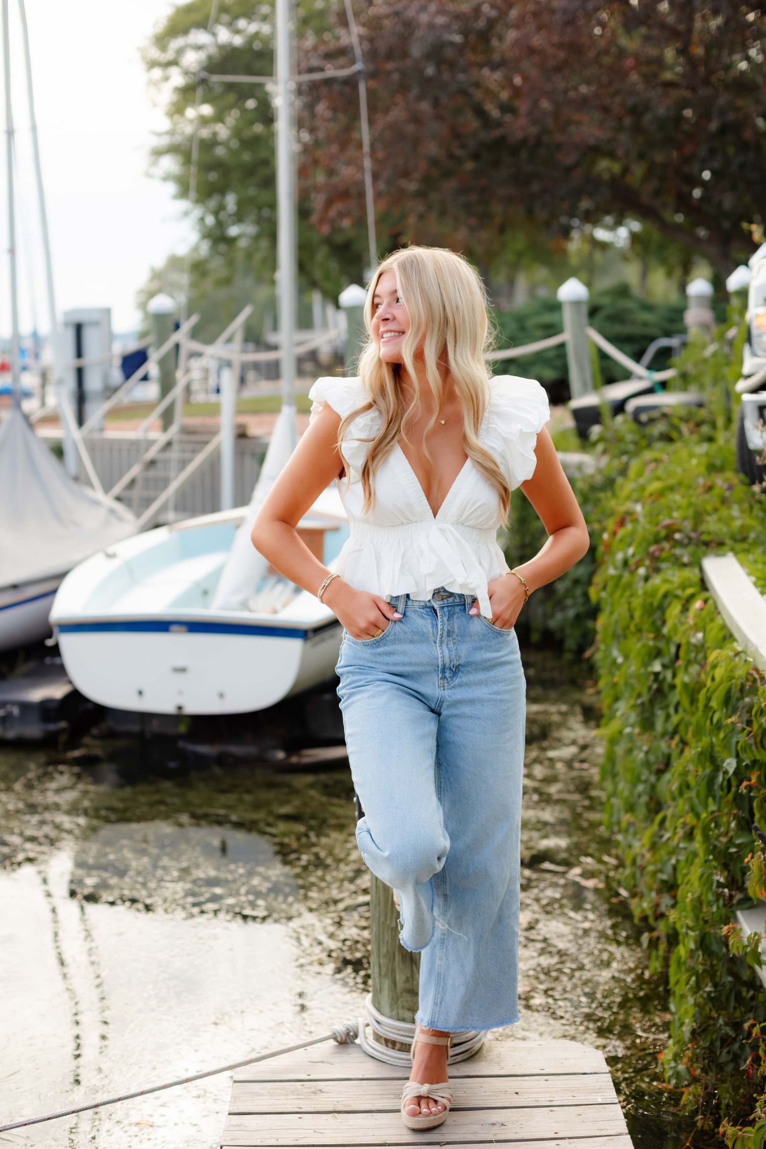 Minnetonka, Minnesota High School senior photography with Willow & Wren Photography. Downtown Wayzata, Minnesota.