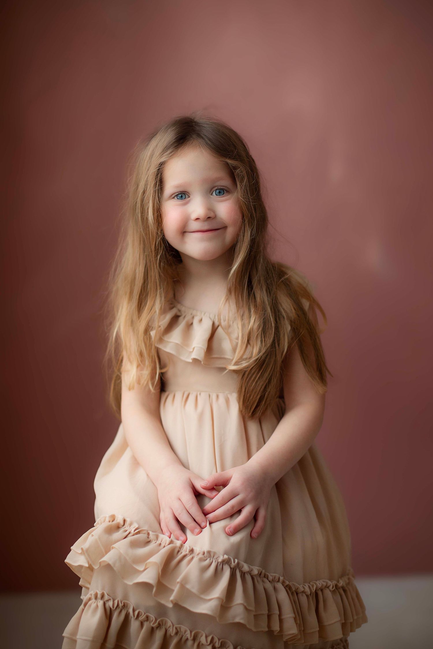 Willow & Wren Photography studio in Chaska, Minnesota. Portrait photography.  Hand painted backdrop by Wendy with Willow & Wren Photography.