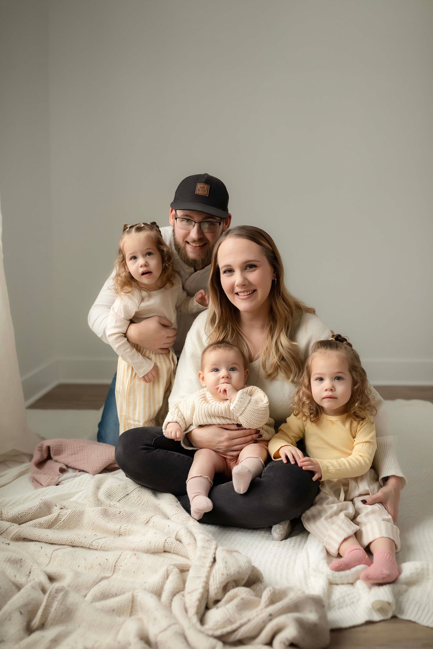 Candid family moment with playful interactions with Willow & Wren Photography.