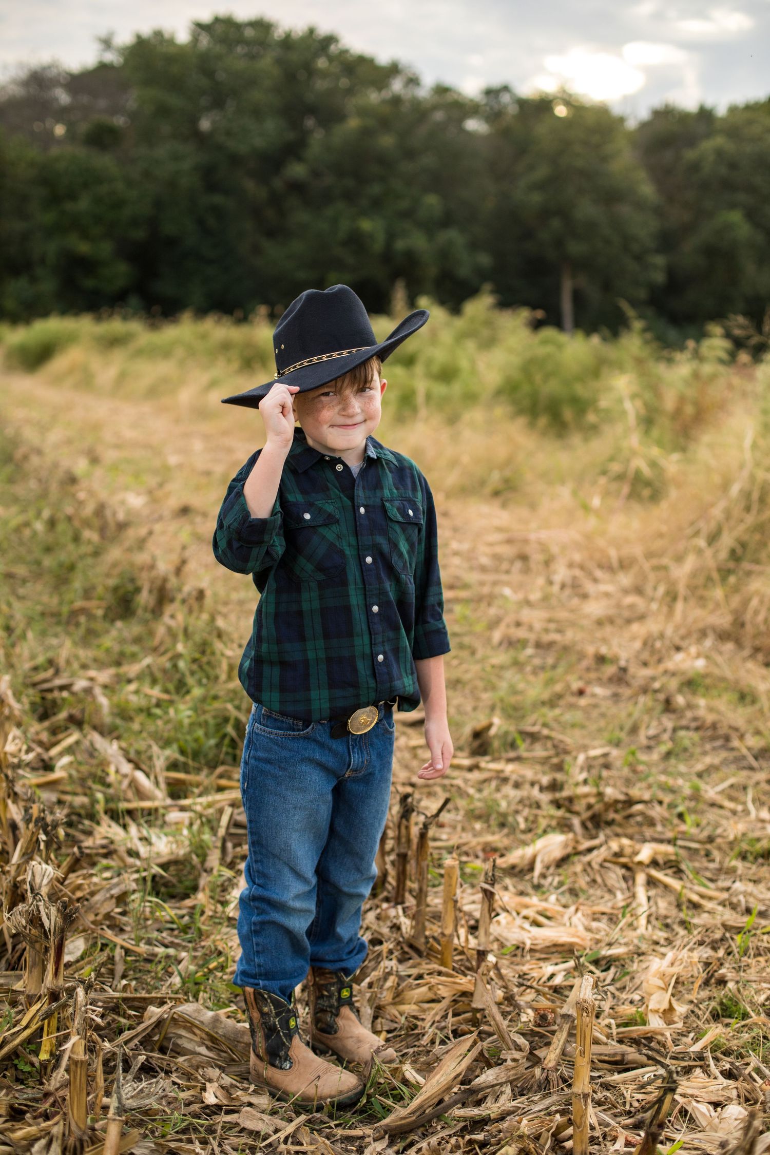 a young boy wearing a justin cowboy hat delaware farm photography