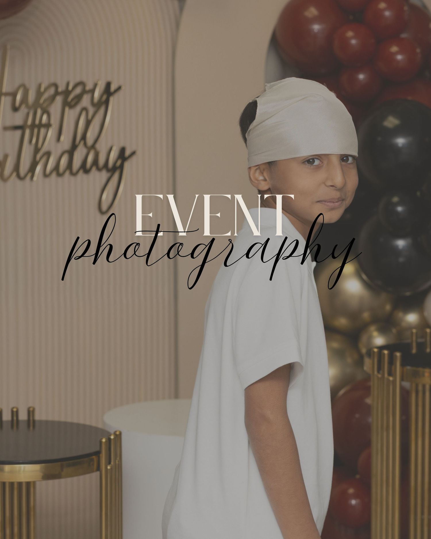 Professional maternity photography session with balloons and decor in warm tones.