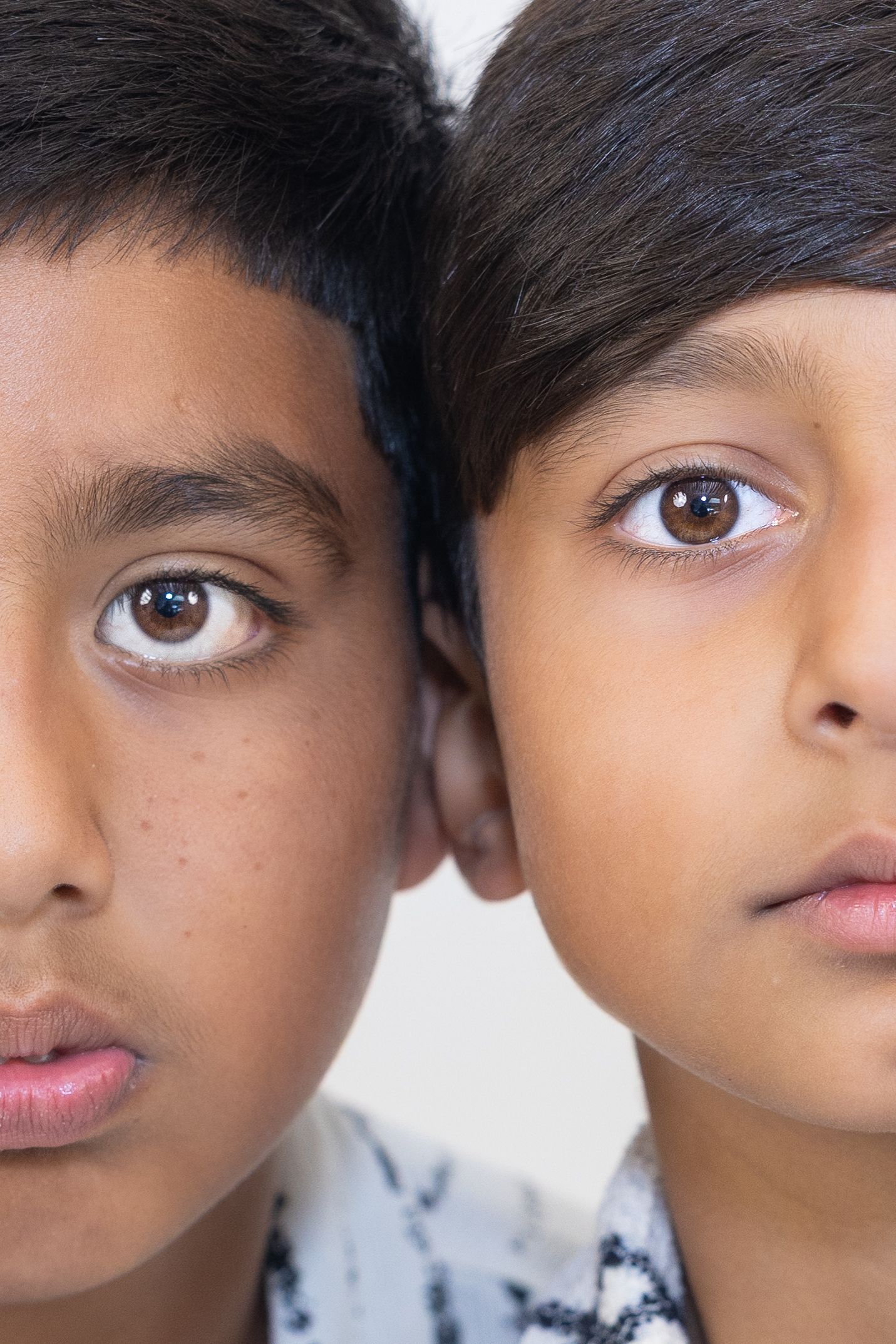 Close-up portrait series showing different angles and expressions against white background.