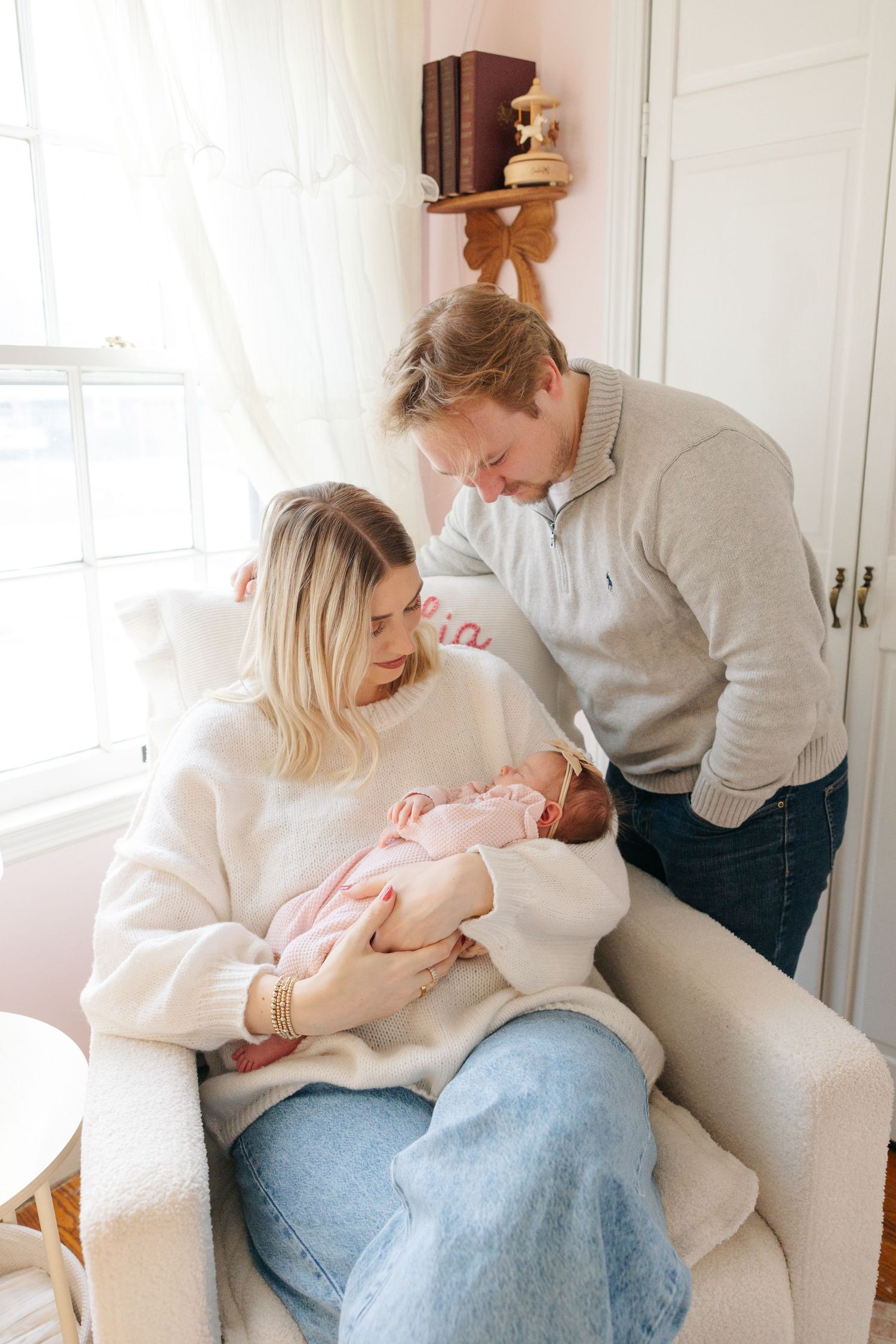 Kansas City Lifestyle Newborn Photographer in Mission Kansas Couple Snuggling Baby