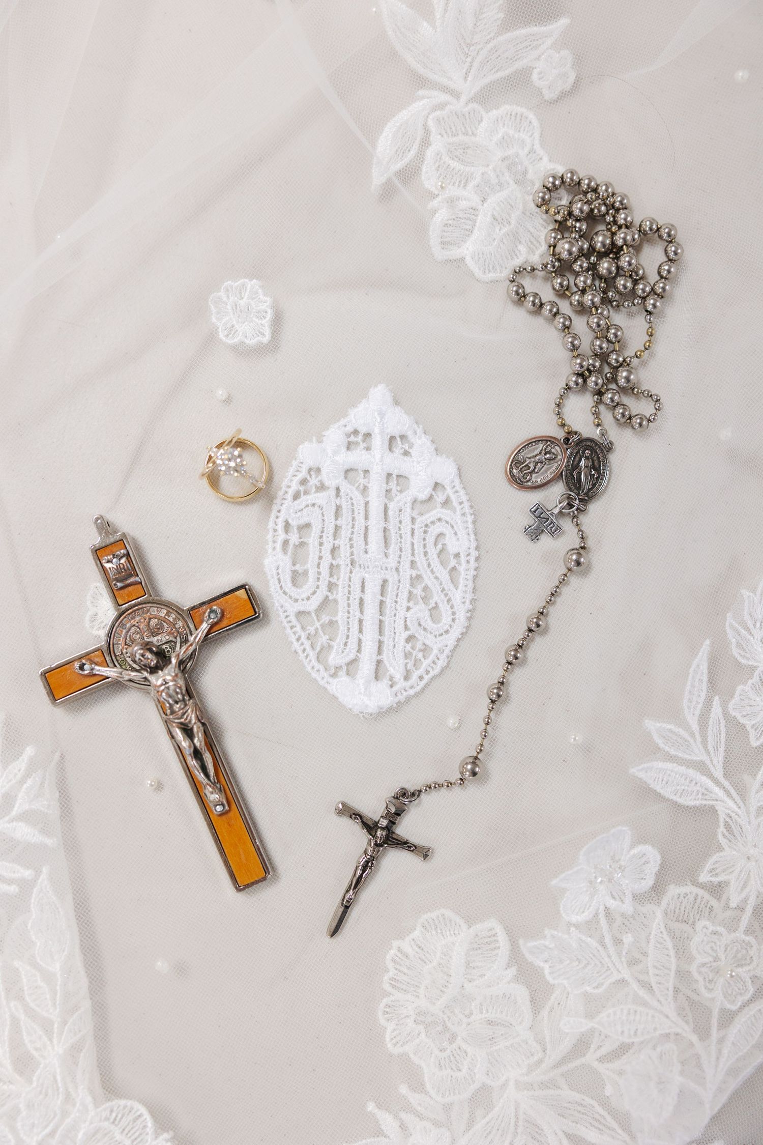 Kansas City Catholic Wedding Photographer Our Lady of Good Counsel Veil with Crucifix Rosary and Rings