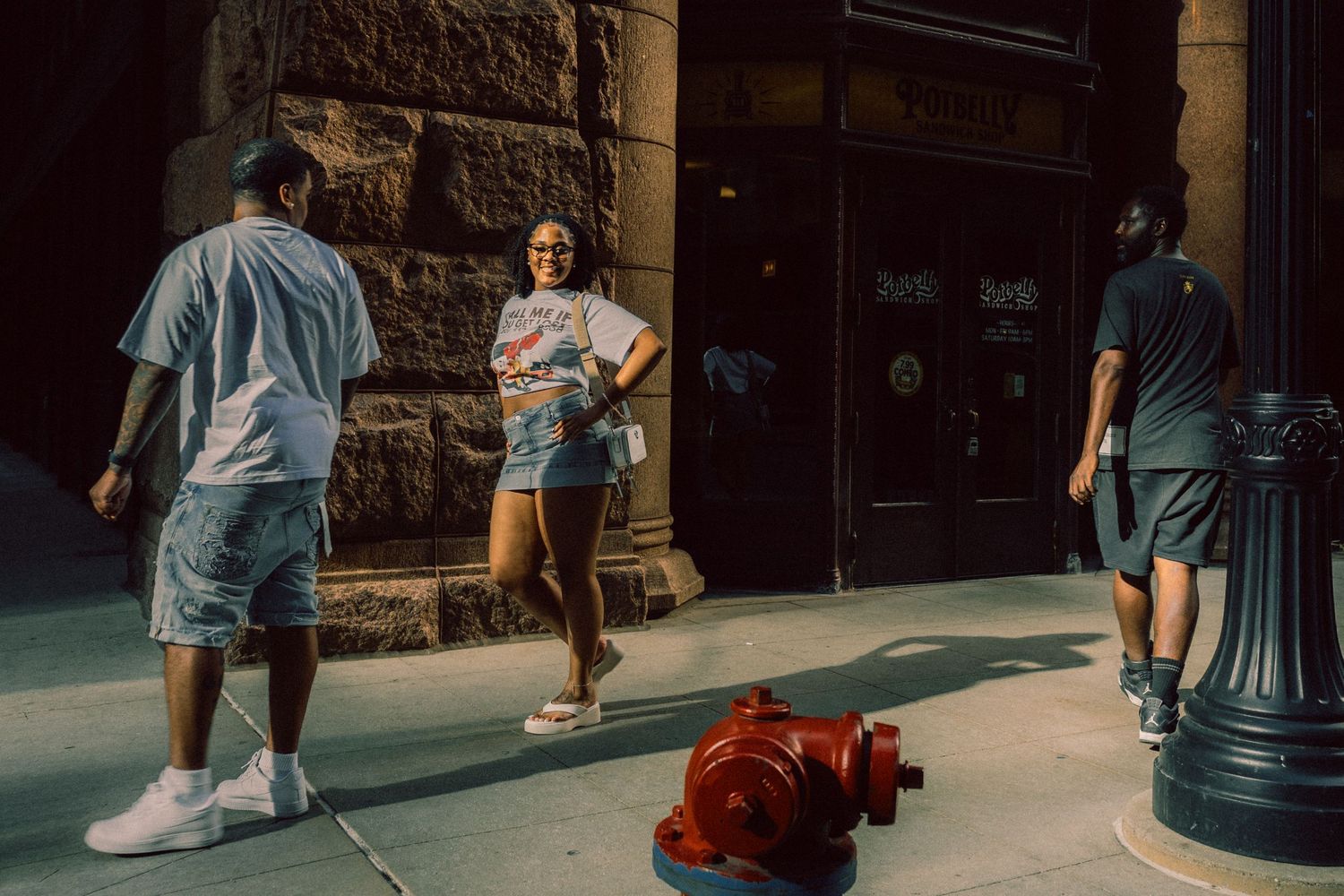 Candid street scene with pedestrians in dramatic afternoon light in downtown Chicago
