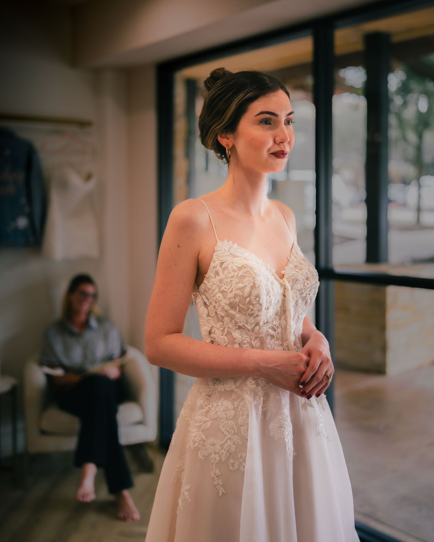 Bride wearing a wedding gown inside a bridal shop in Austin, Texas