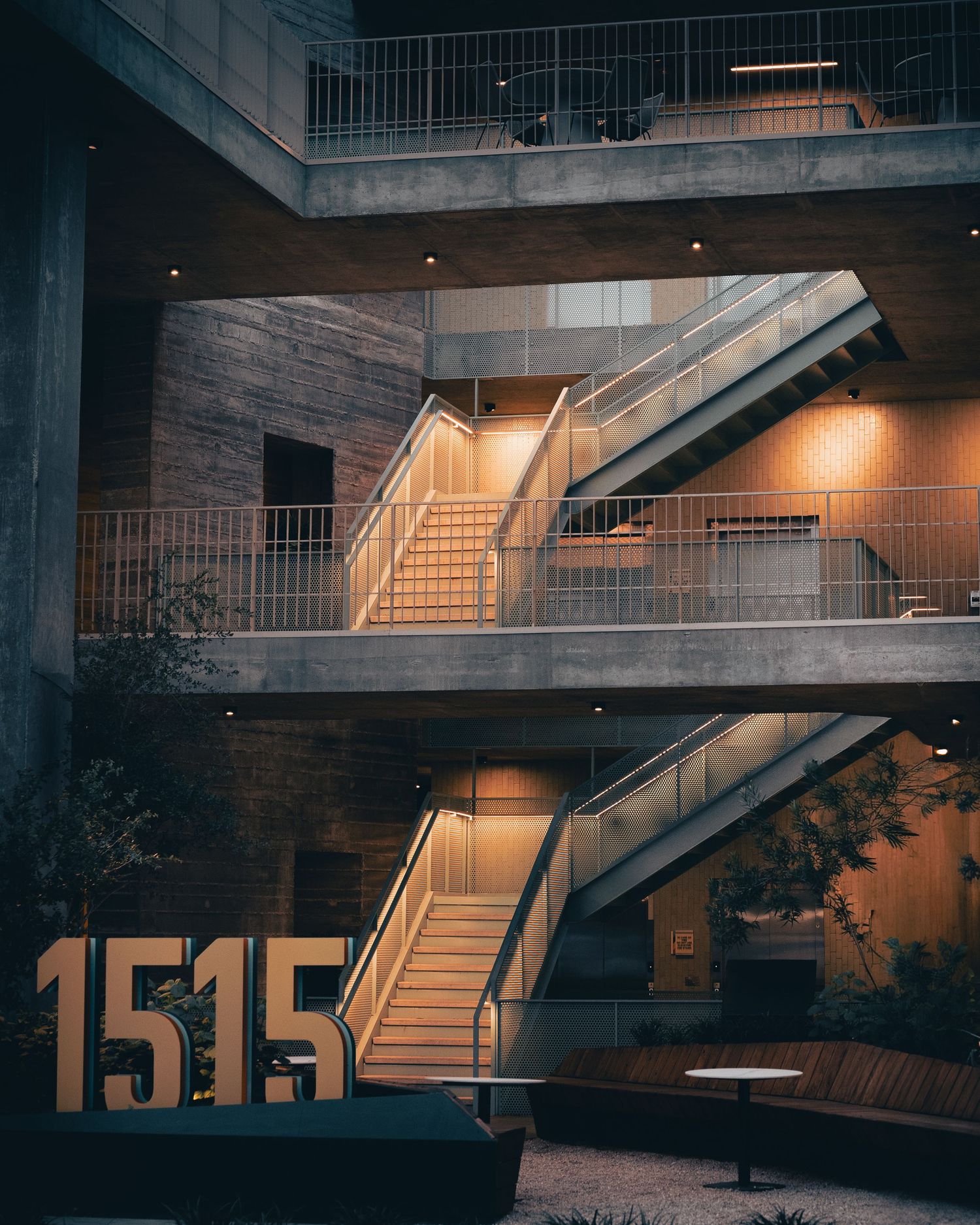 Illuminated exterior staircases of a Chioco Design building in East Austin, Texas