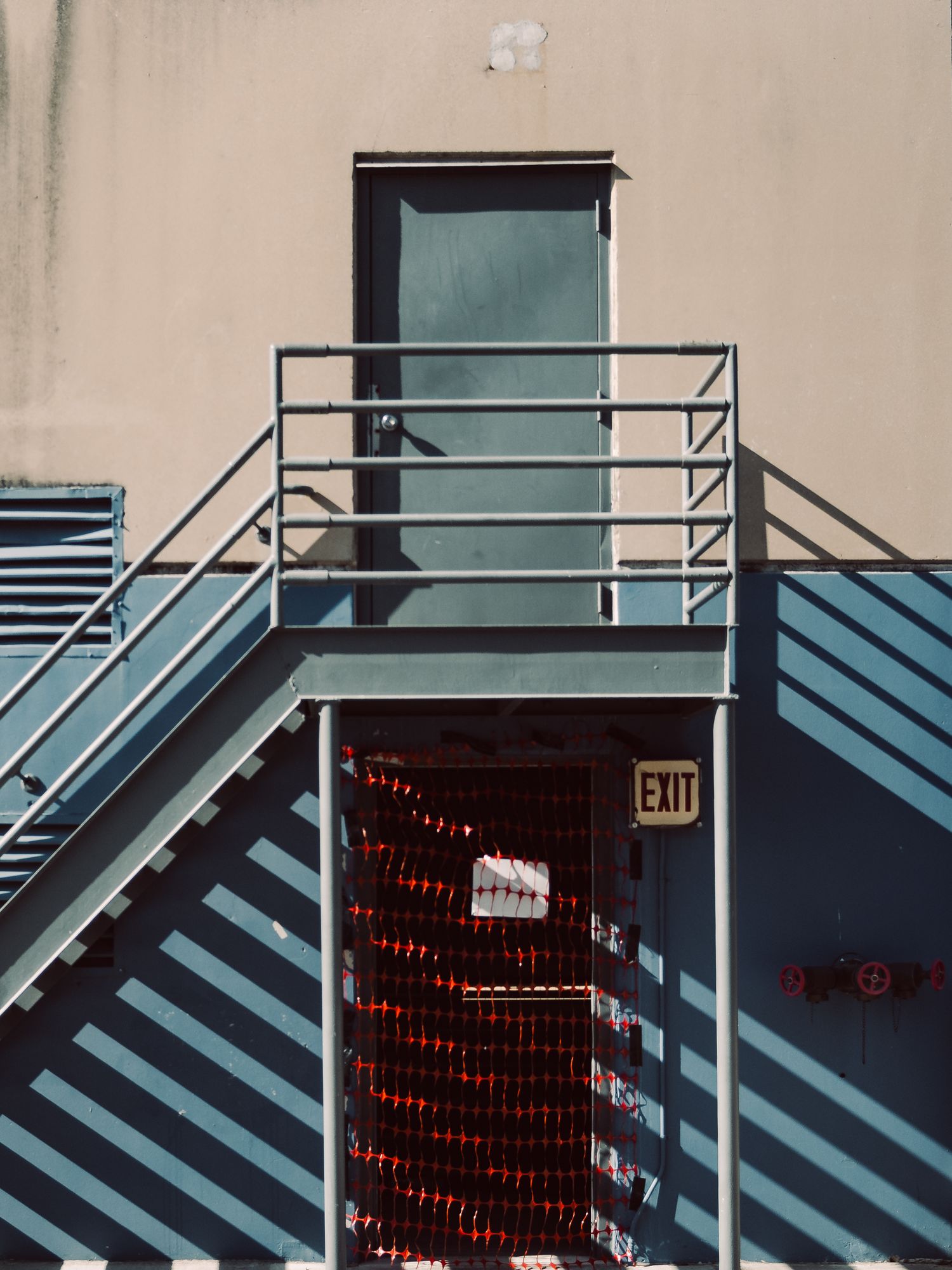 Modern exterior staircase and geometric architectural details in downtown Austin