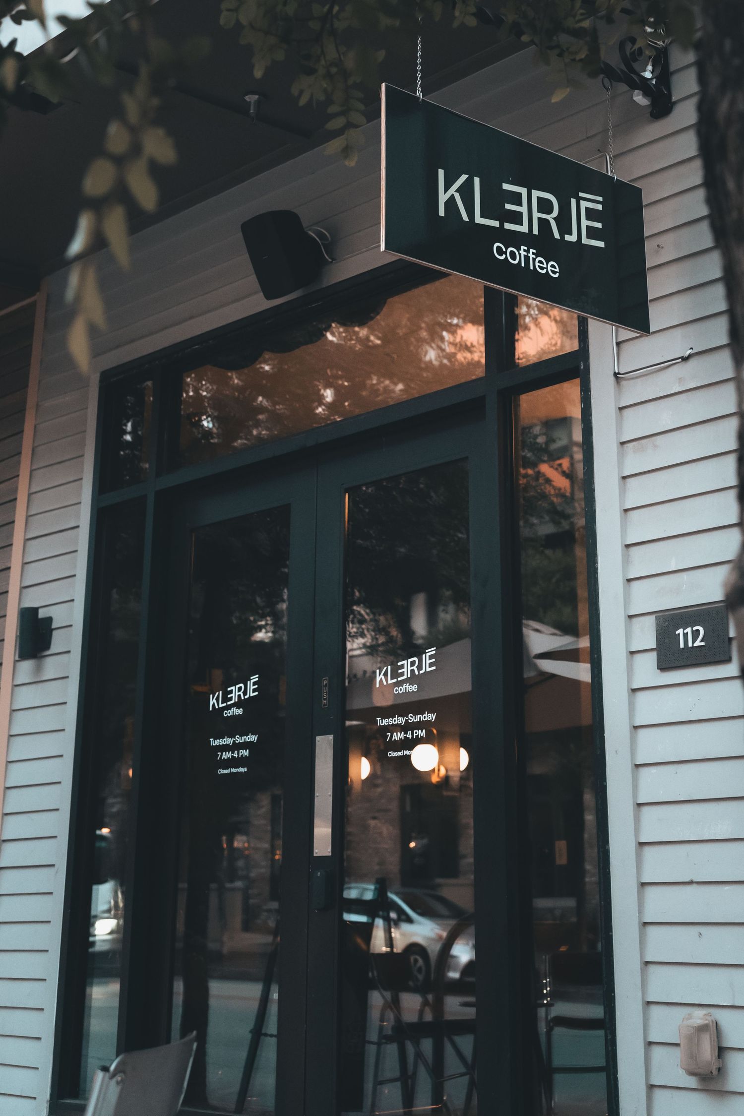 Storefront entrance of Klerje Coffee in East Austin, Texas