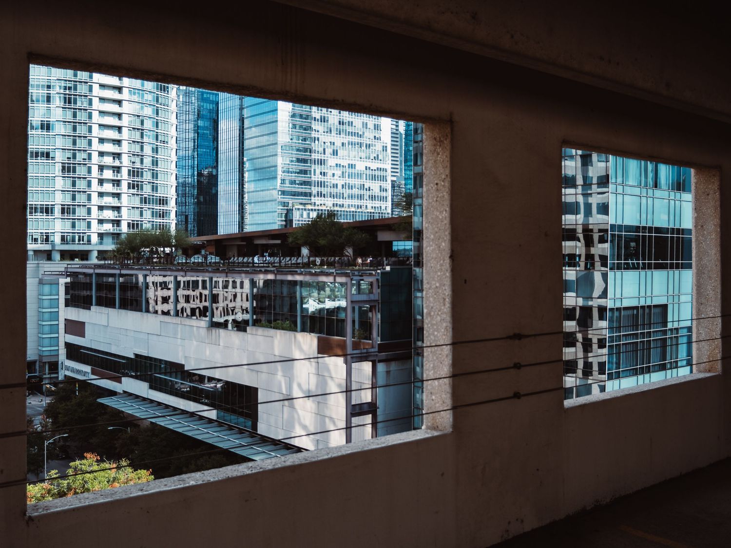 Downtown Austin architecture framed through openings in a parking structure
