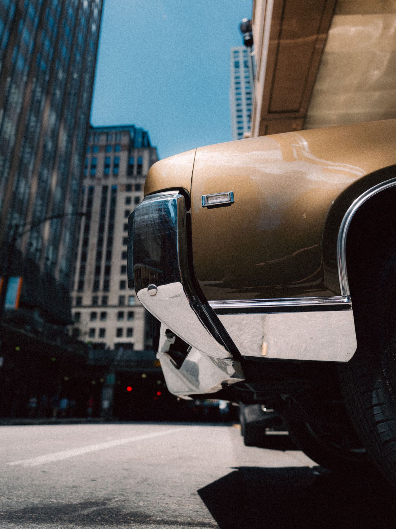 Vintage car photographed among downtown Chicago architecture
