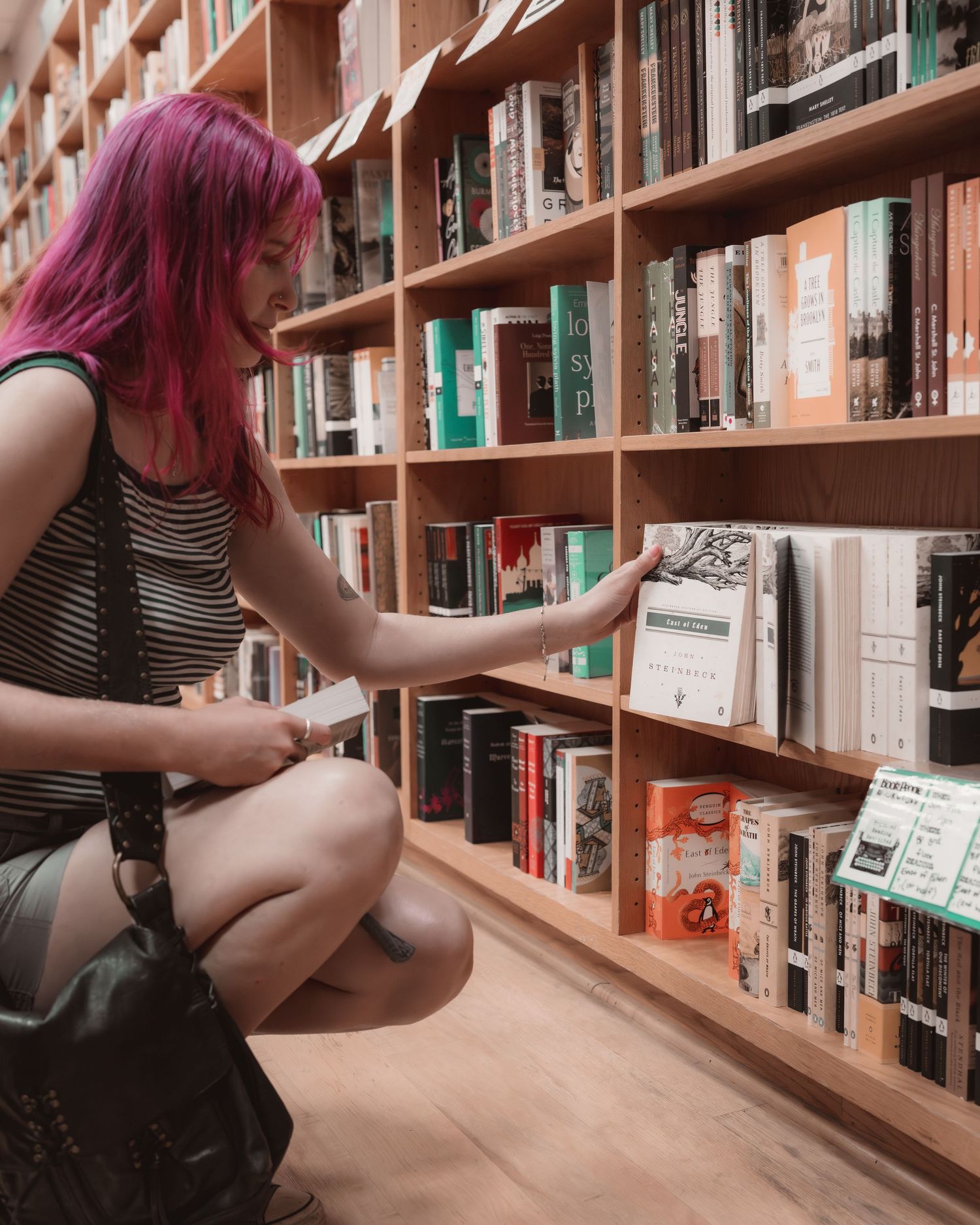 Customer browsing bookshelves at BookPeople in Austin, Texas